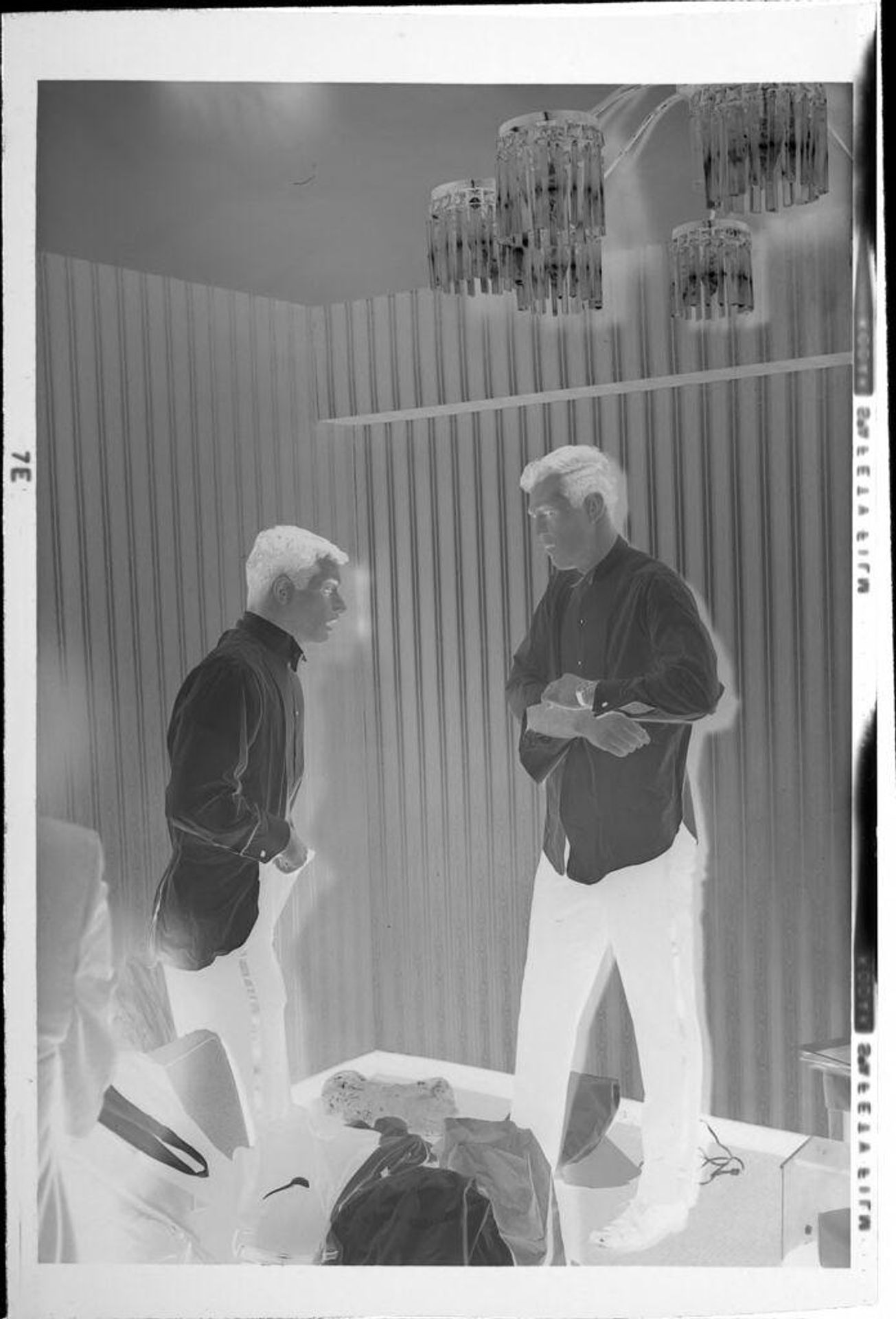 Untitled (young men getting dressed for ball) by Robert Burian