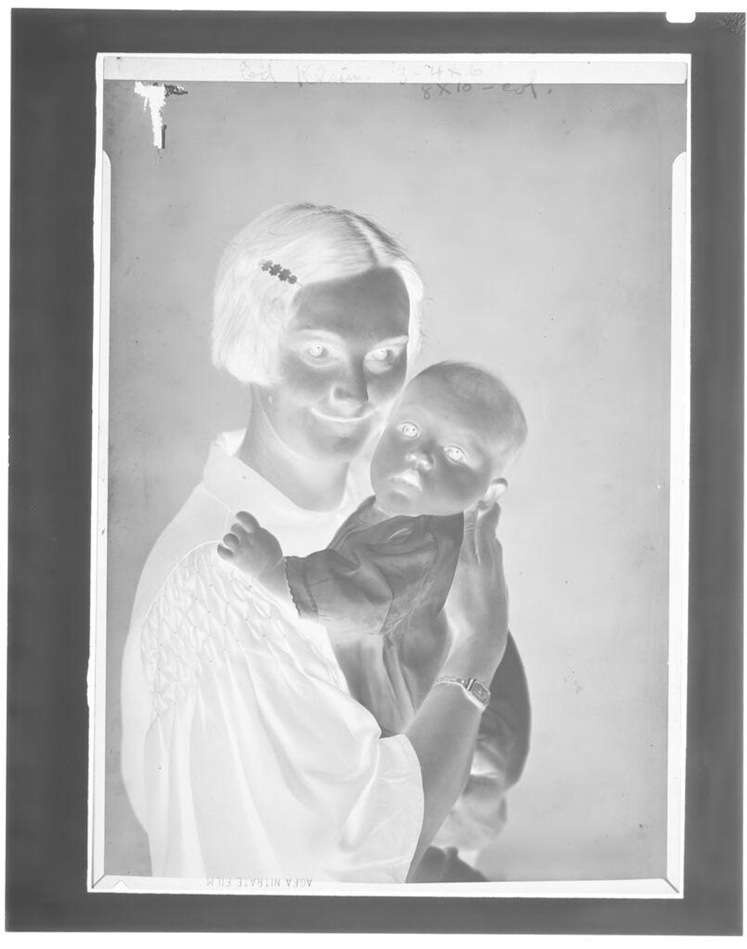 Untitled (mother and baby) by John Deusing