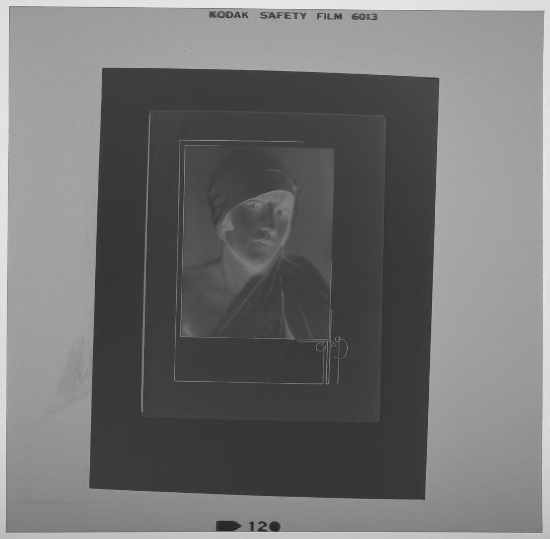 Untitled (photograph of woman in head wrap, one shoulder bare) by Paul Gittings