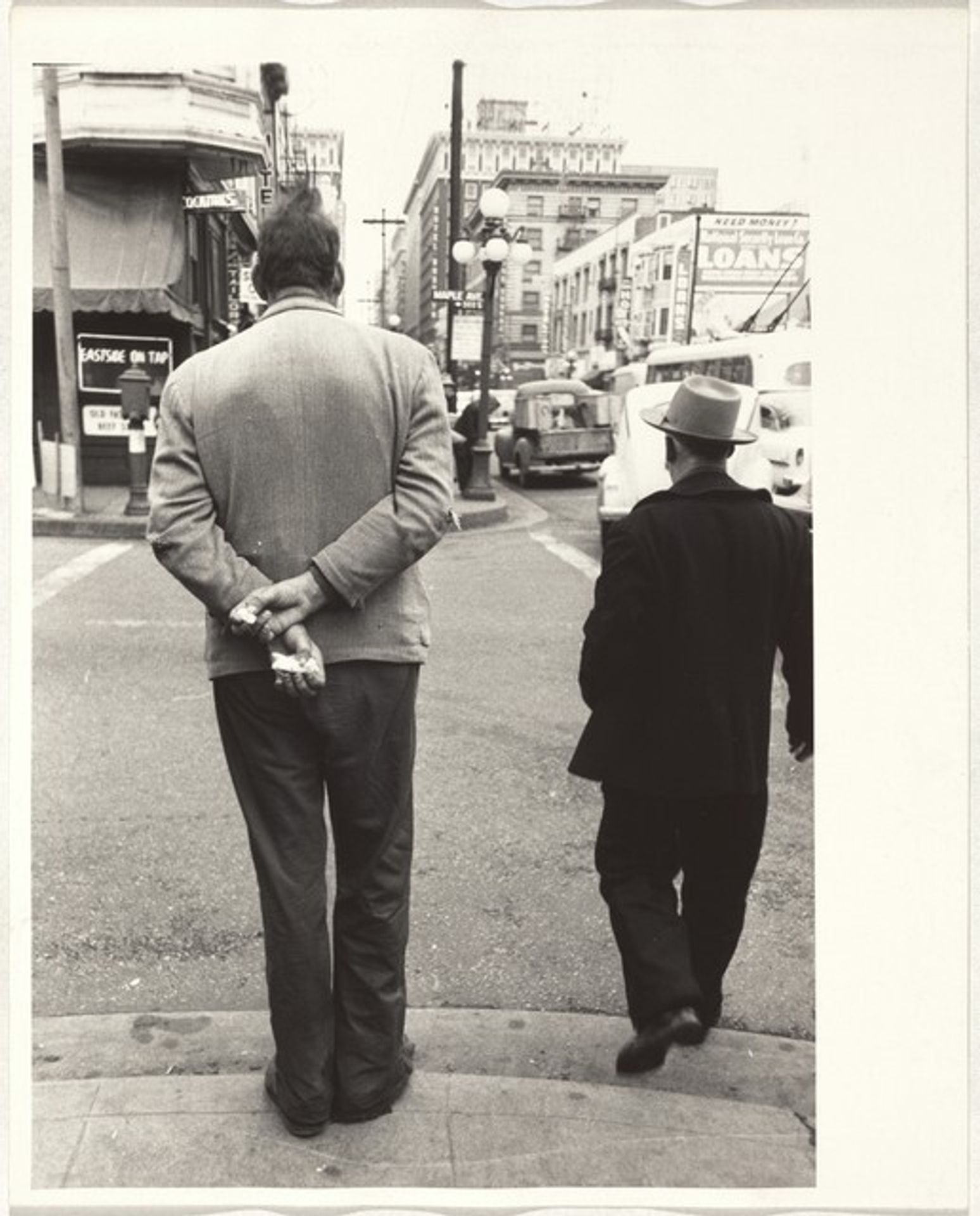 Man waiting to cross street--Los Angeles by Robert Frank
