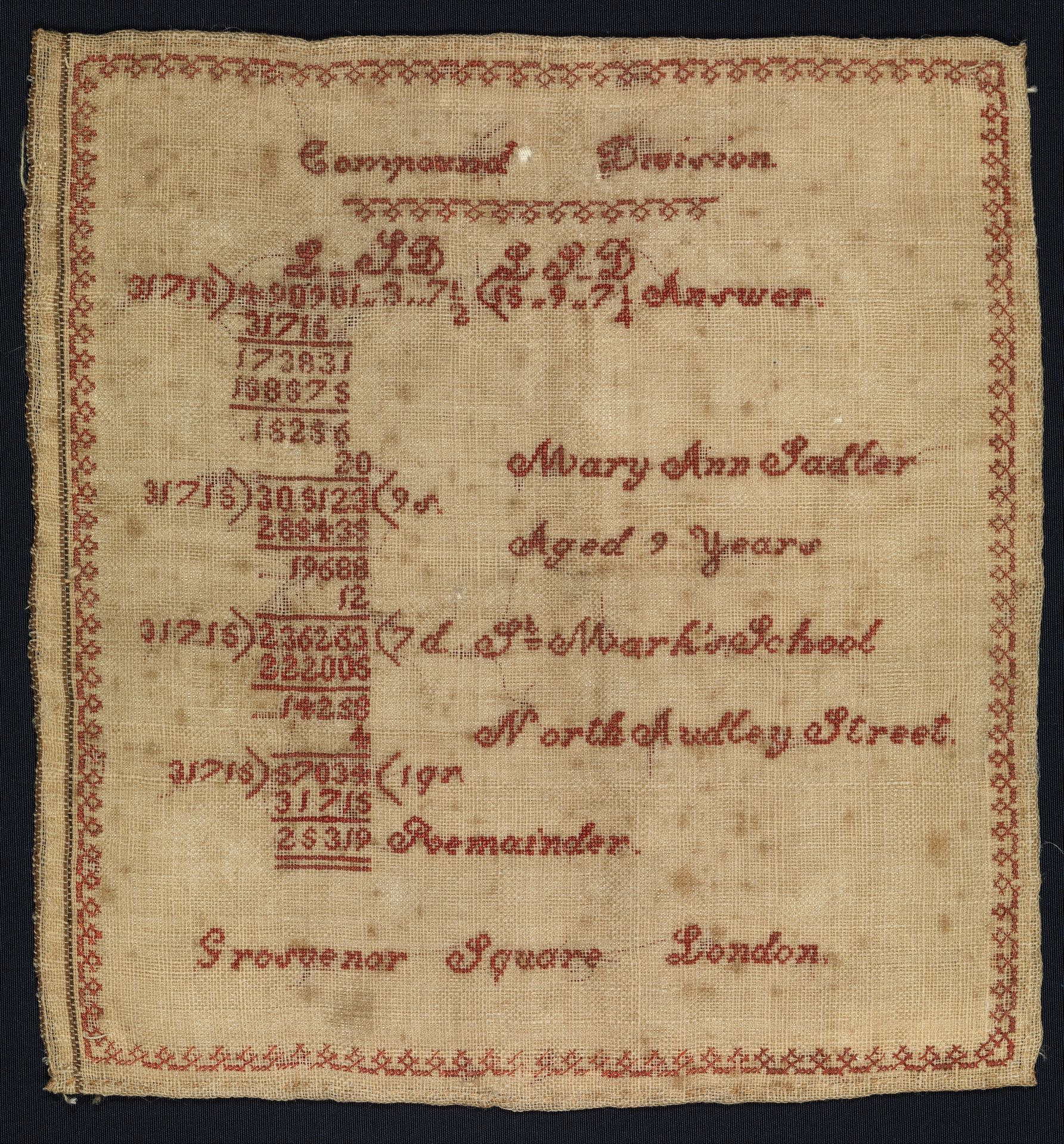 Sampler with compound division equation by Mary Ann Sadler
