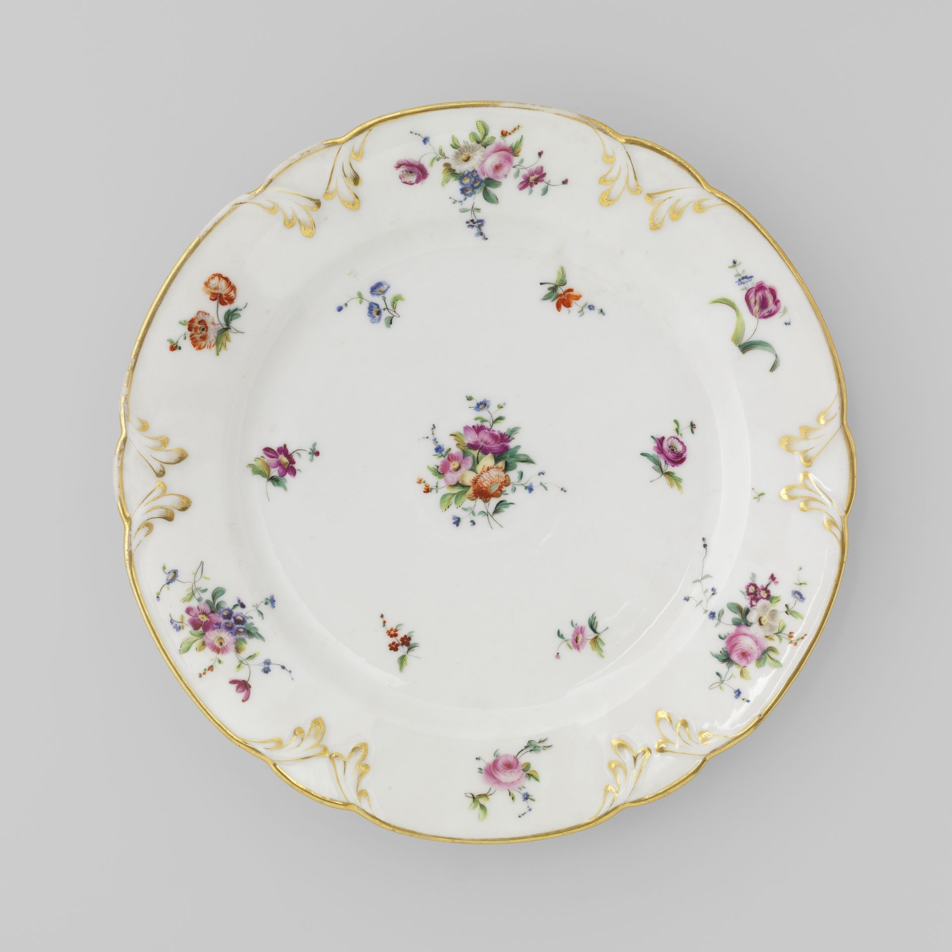 Plate with bouquets and flower sprays by Fabriek Dominique Denuelle