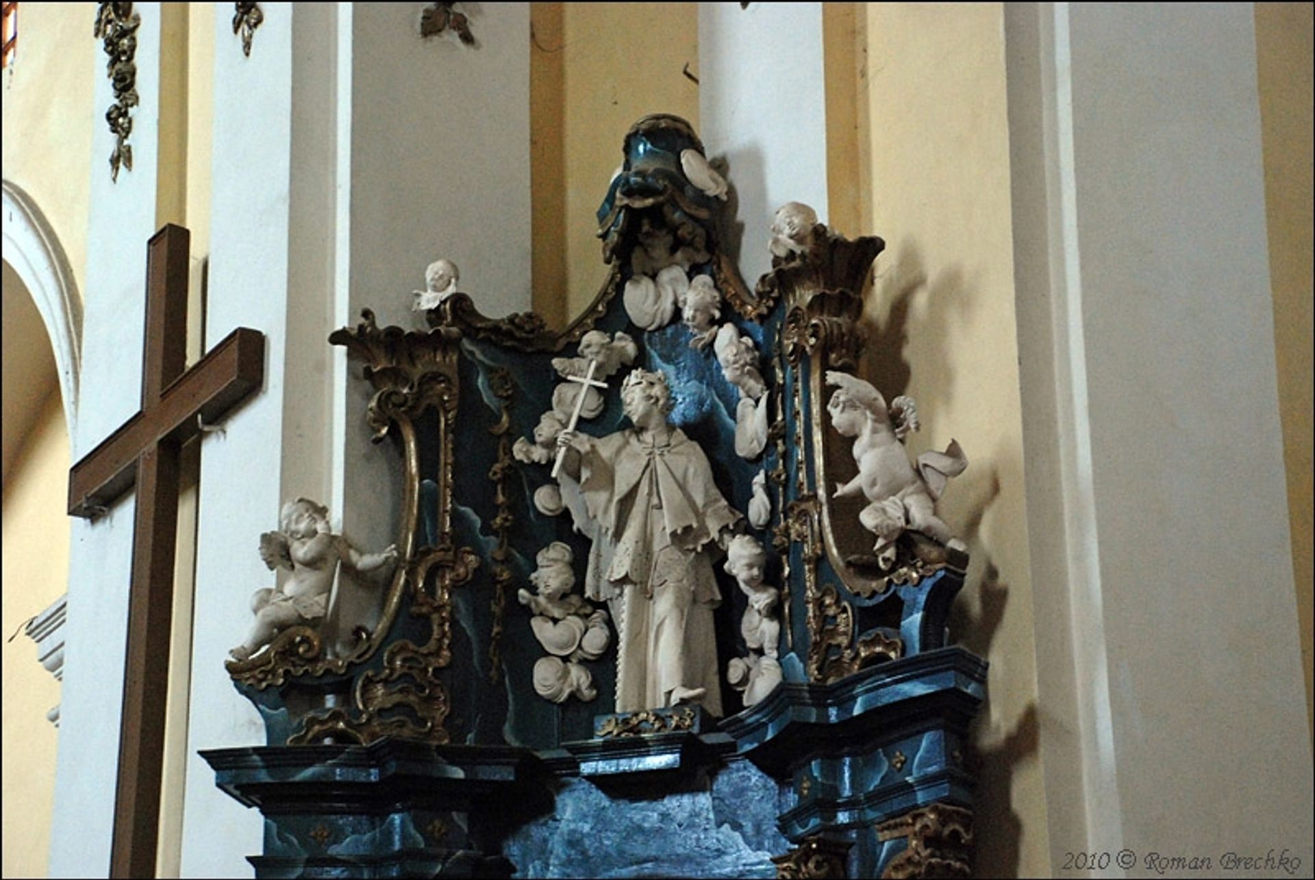 Altar of St. Nicholas with a sculpture of Jan Nepomuk by Johann Georg Pinzel