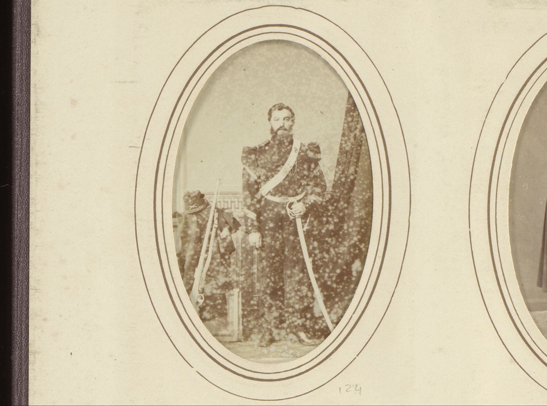 Portret van een man in militair uniform met sabel en vuurwapen by Eugene Guérin