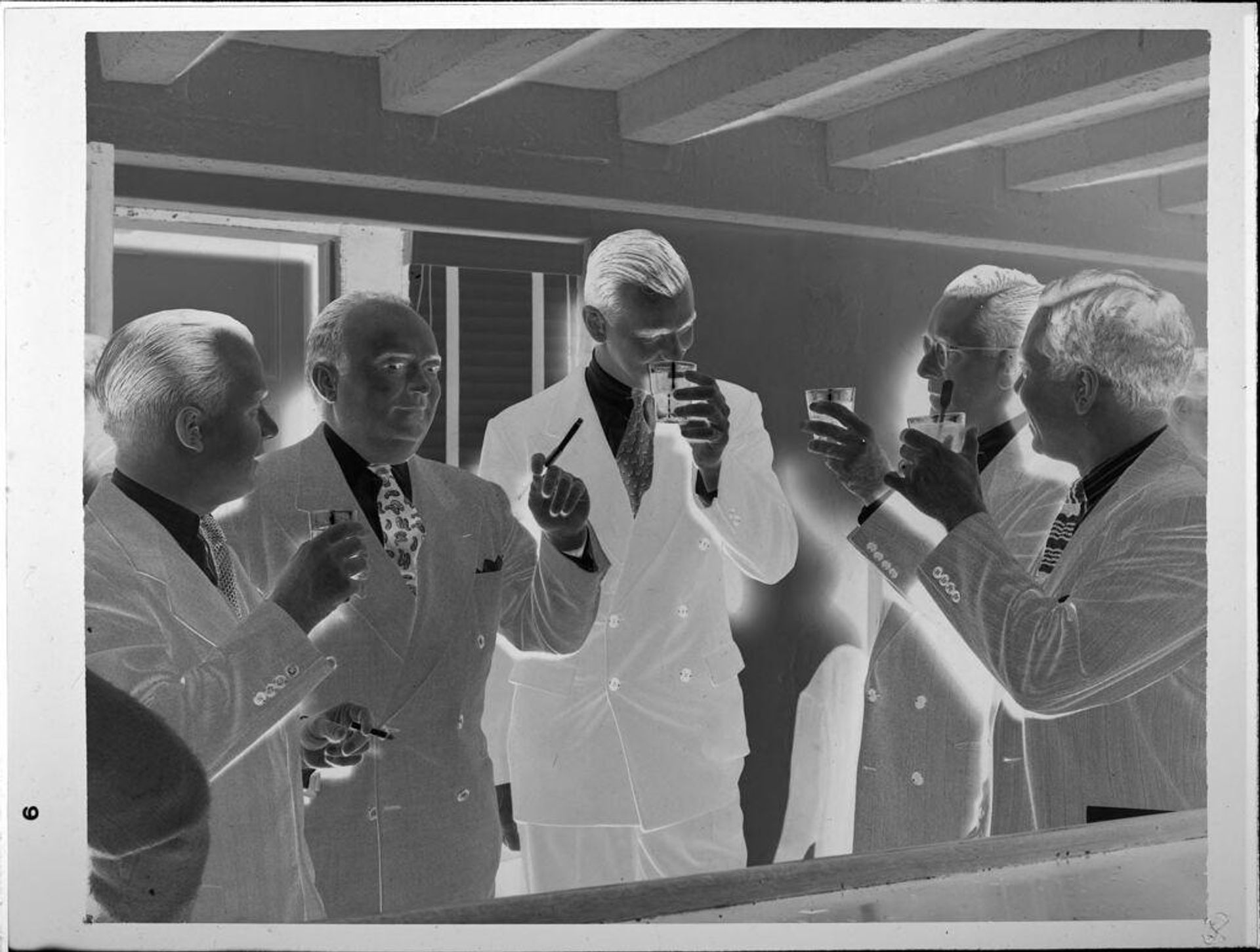 Untitled (men smoking and drinking) by John Howell