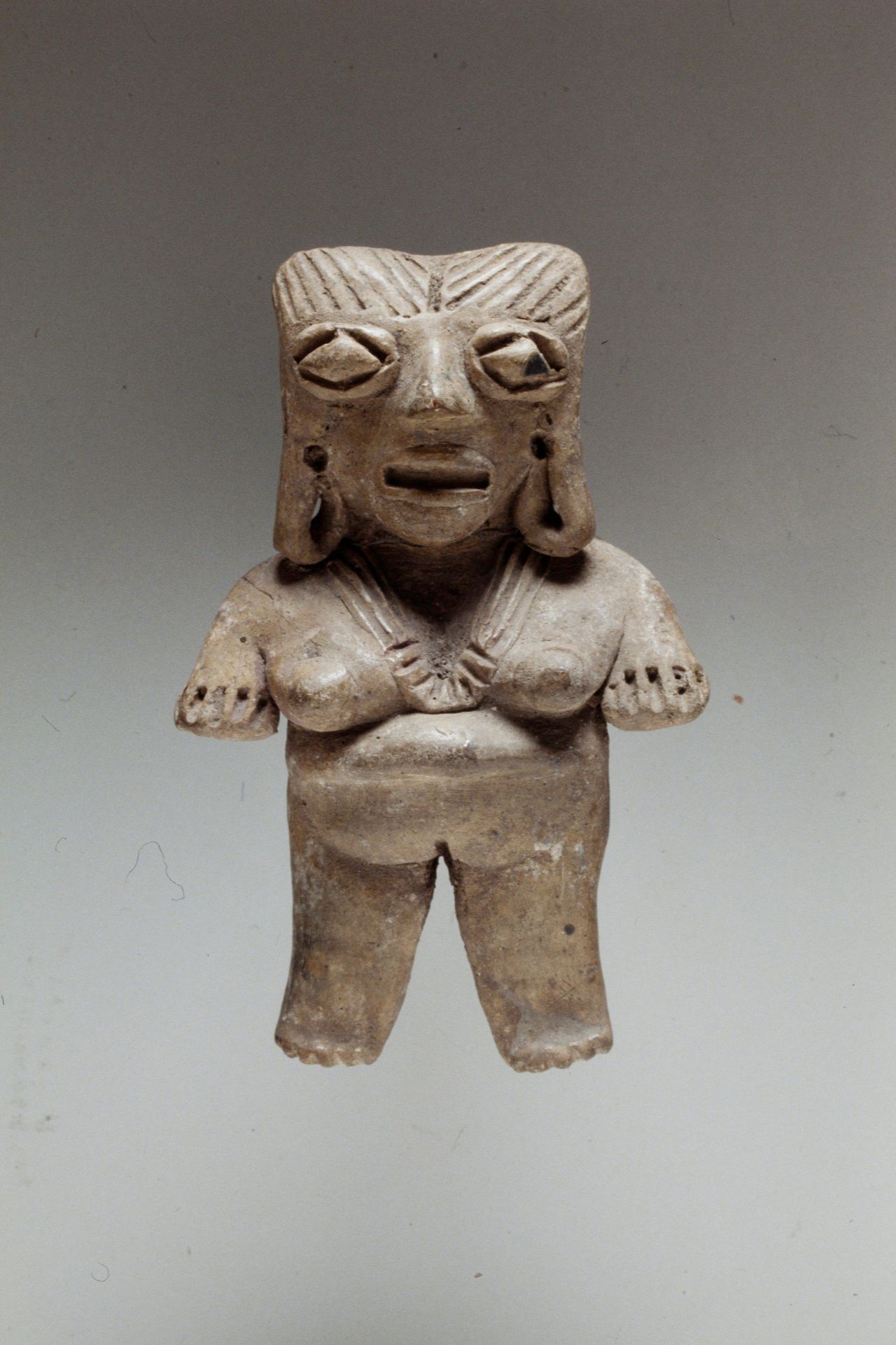 Standing female figure by Chupícuaro