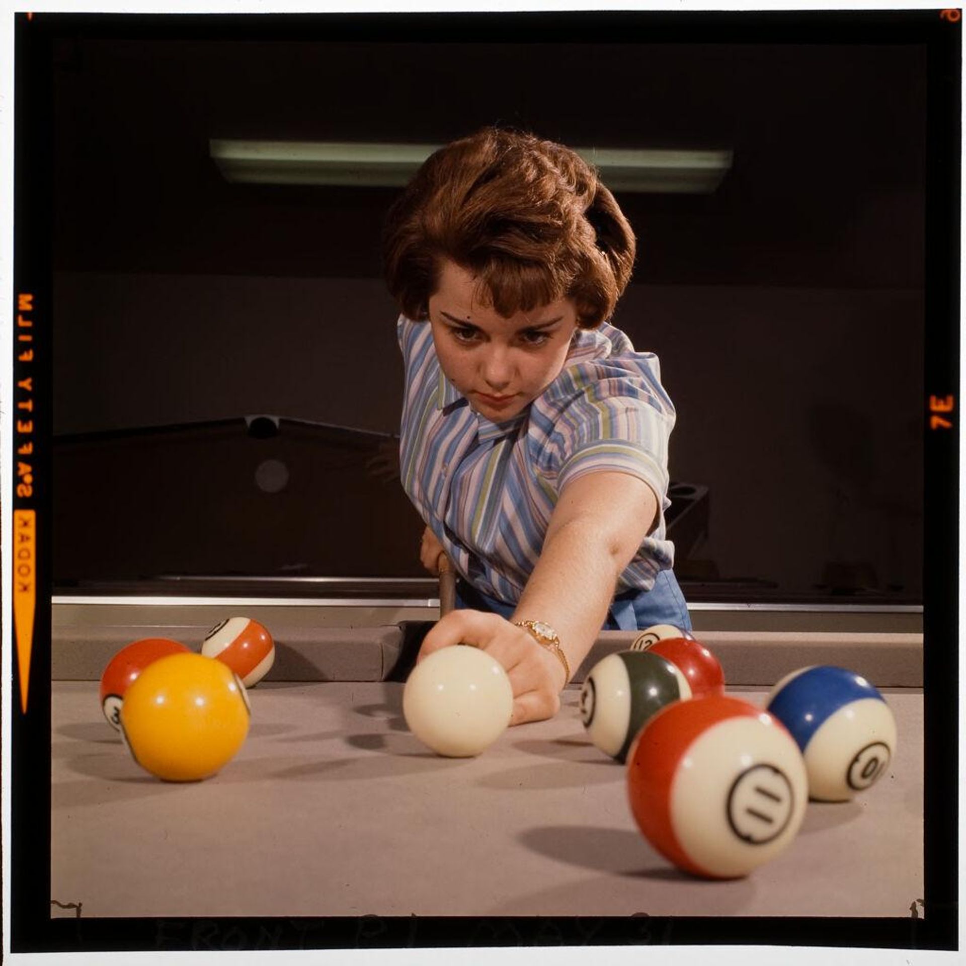 Untitled (woman playing pool) by Jack Gould