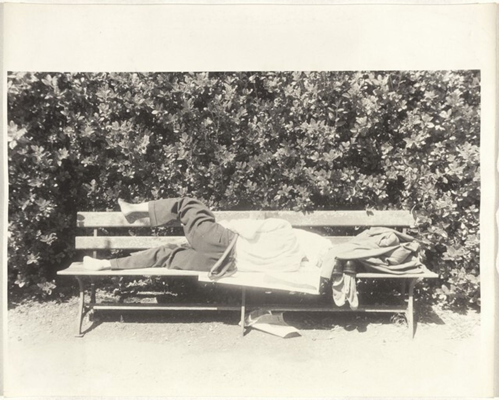 Man asleep on park bench--San Francisco by Robert Frank