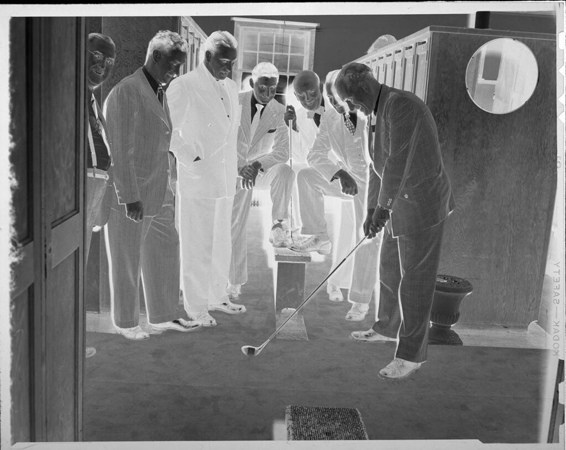 Untitled (men with golf clubs) by Robert Burian