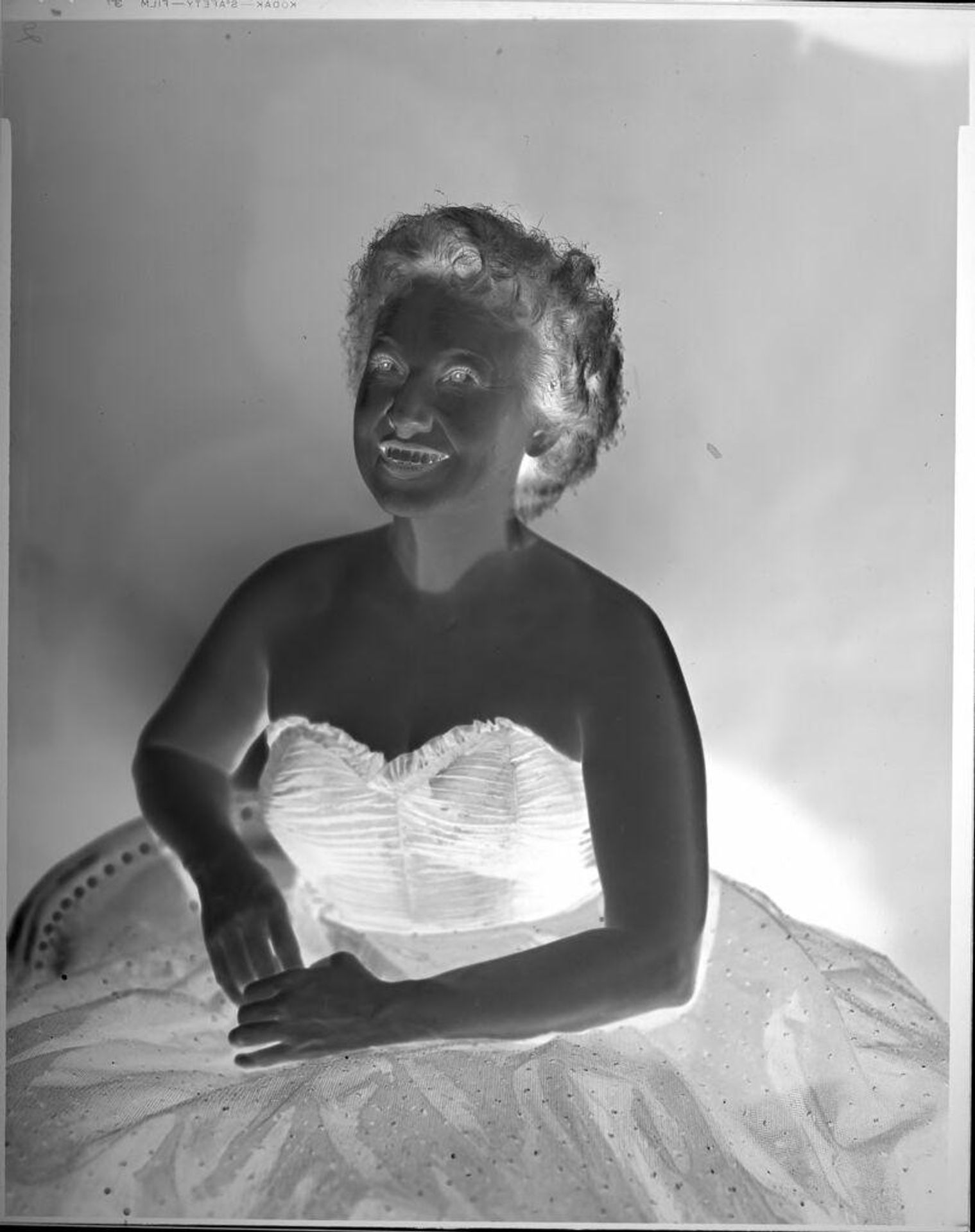 Untitled (portrait of woman in formal gown) by C. Bennette Moore