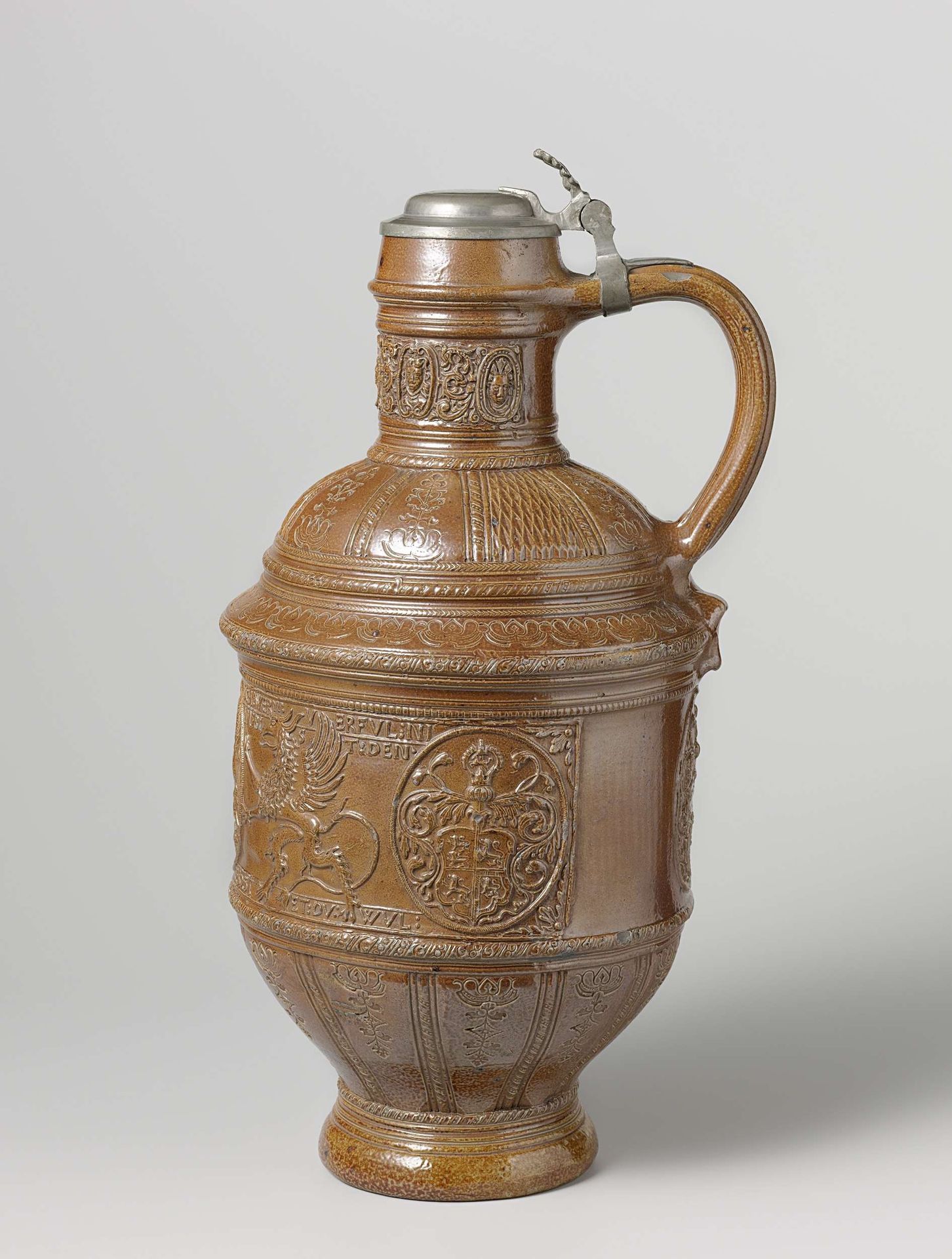 Jug with coats of arms and a pelican among griffins by Jan Baldems Mennicken