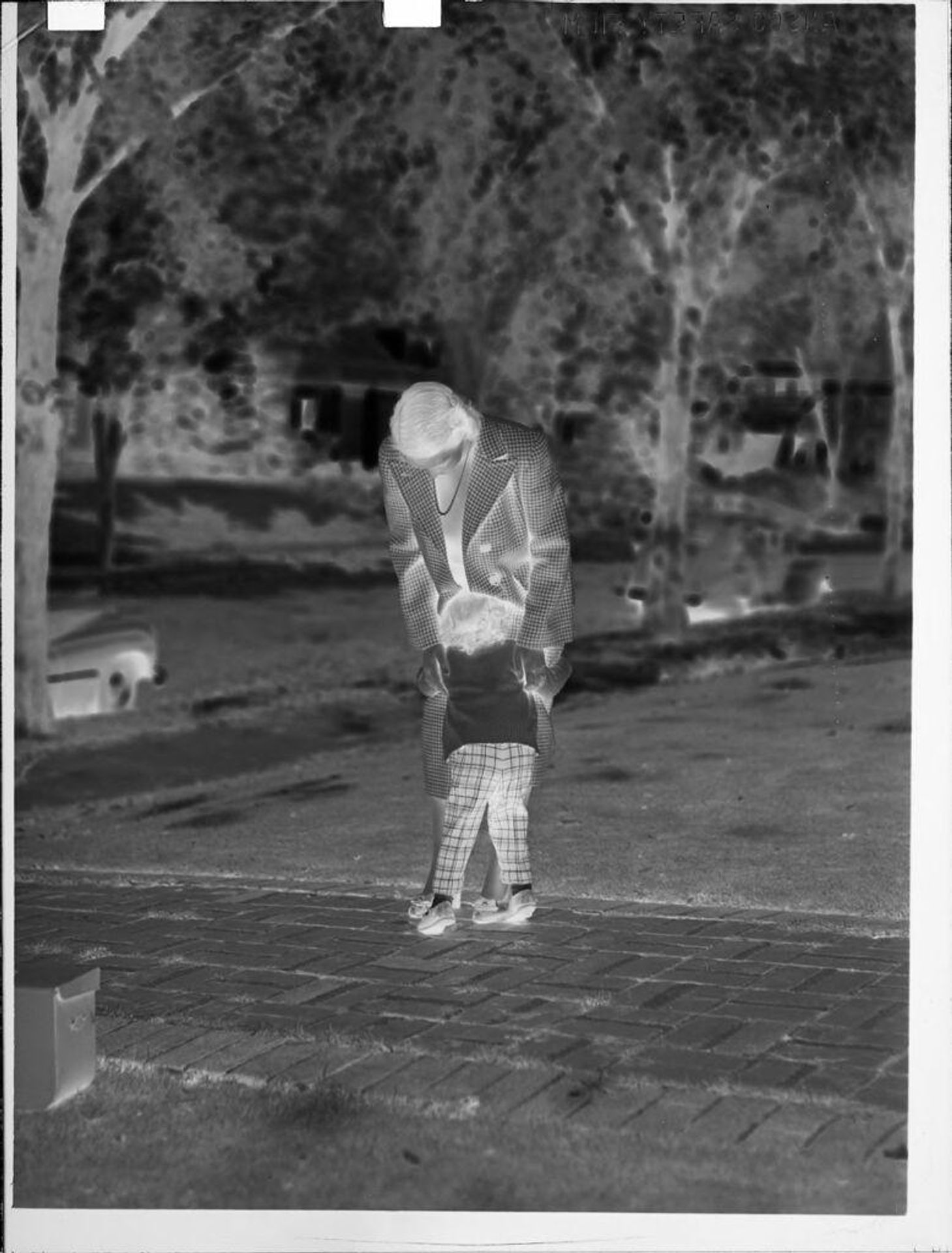 Untitled (woman and child outside) by Lucian and Mary Brown