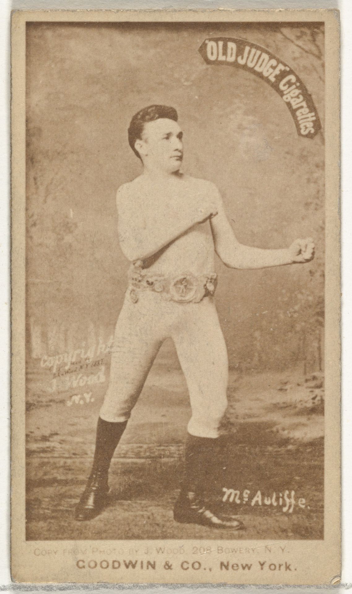 McAuliffe, from the Celebrities and Prizefighters series (N174) for Old Judge Cigarettes by Goodwin & Company