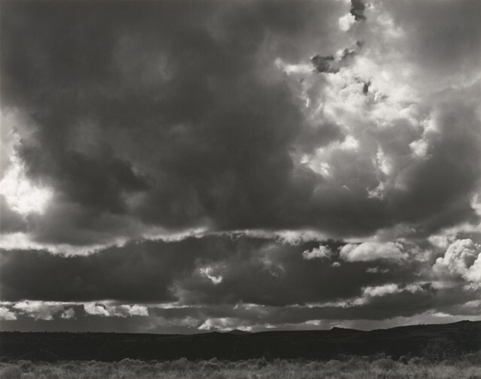 Rain over Modoc Lava Beds by Edward Weston