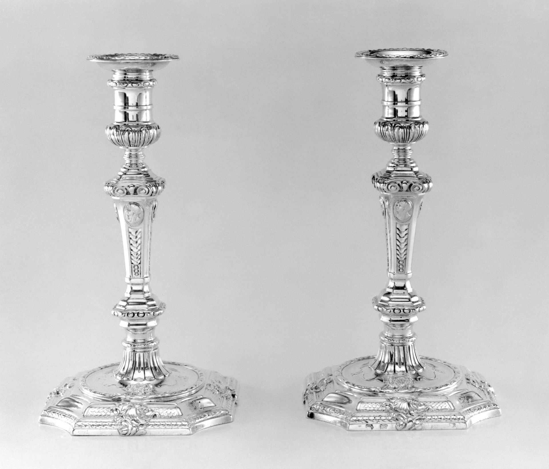 Set of four candlesticks by Paul de Lamerie