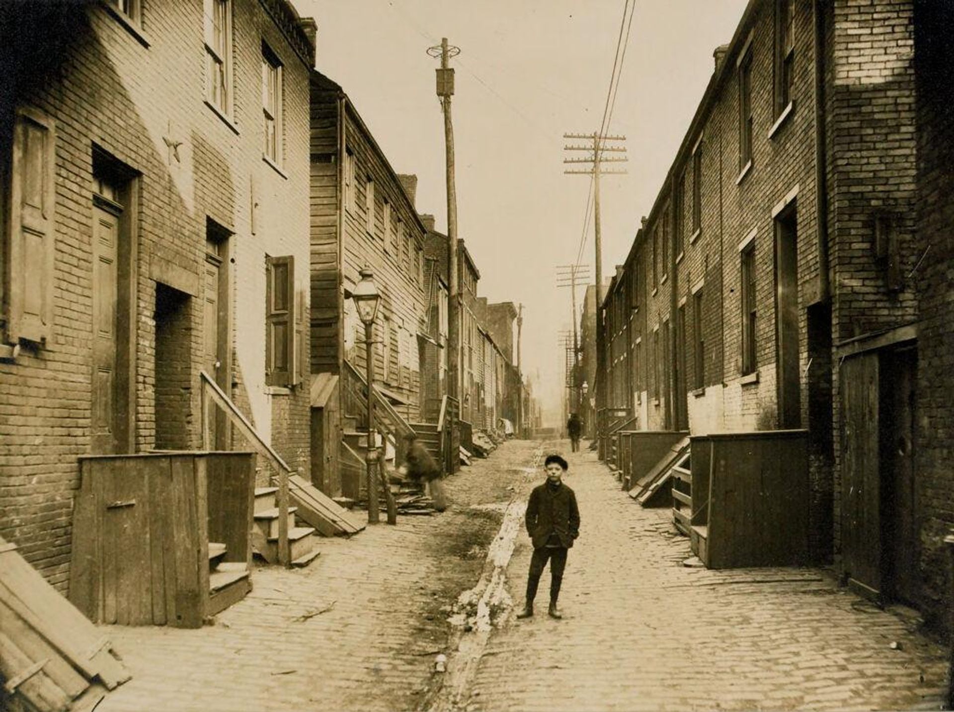 Social Settlements: United States. Pennsylvania. Pittsburgh. "Kingsley House": Kingsley House, Pittsburg, Pa.: Typical Alley. by Lewis Hine