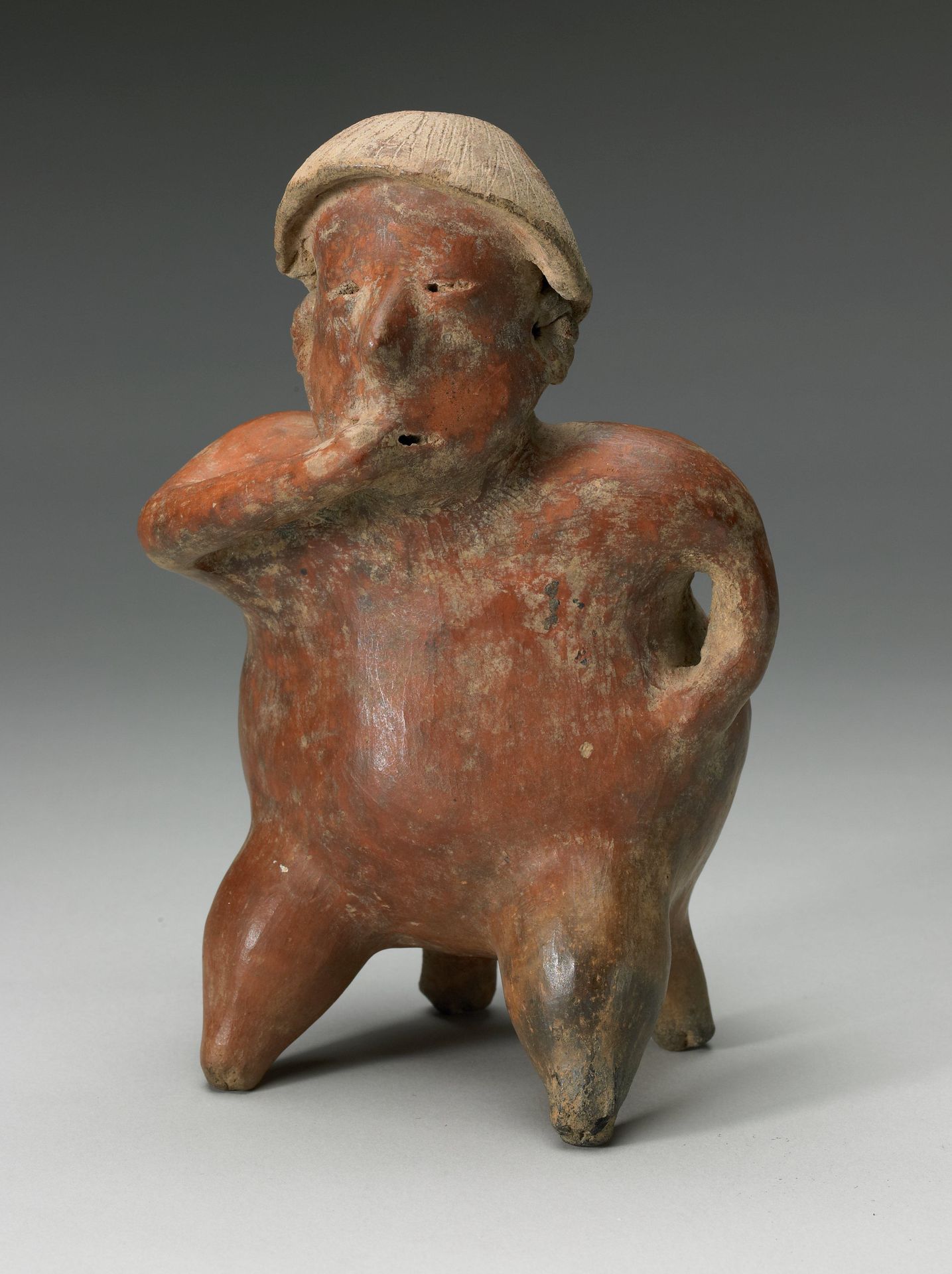 Figure on stool by Nayarit