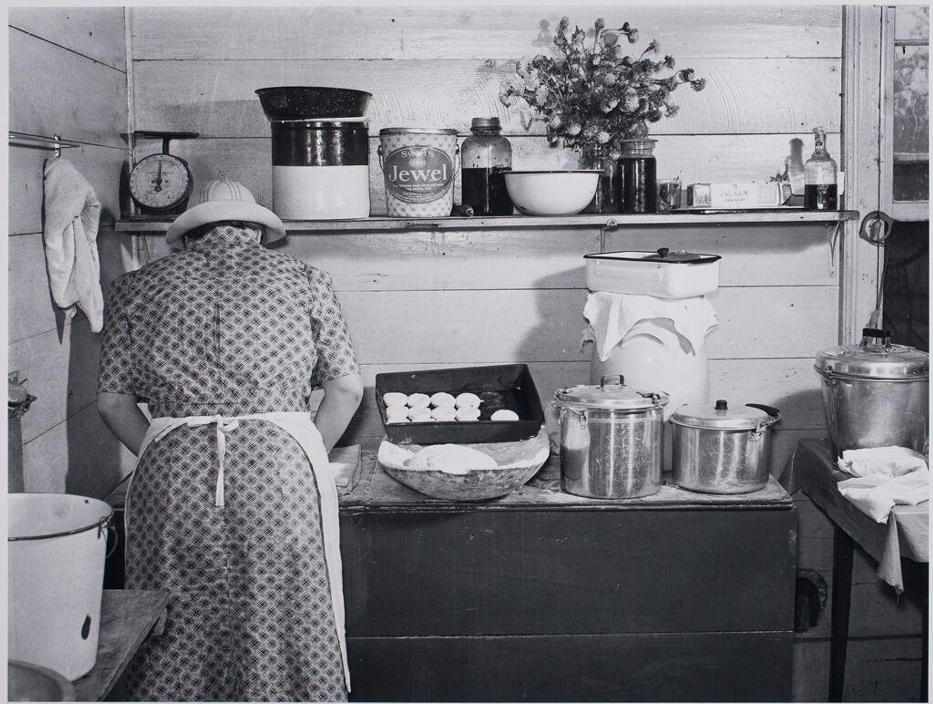 A Member of the Wilkins Family Making Biscuits by Marion Post Wolcott