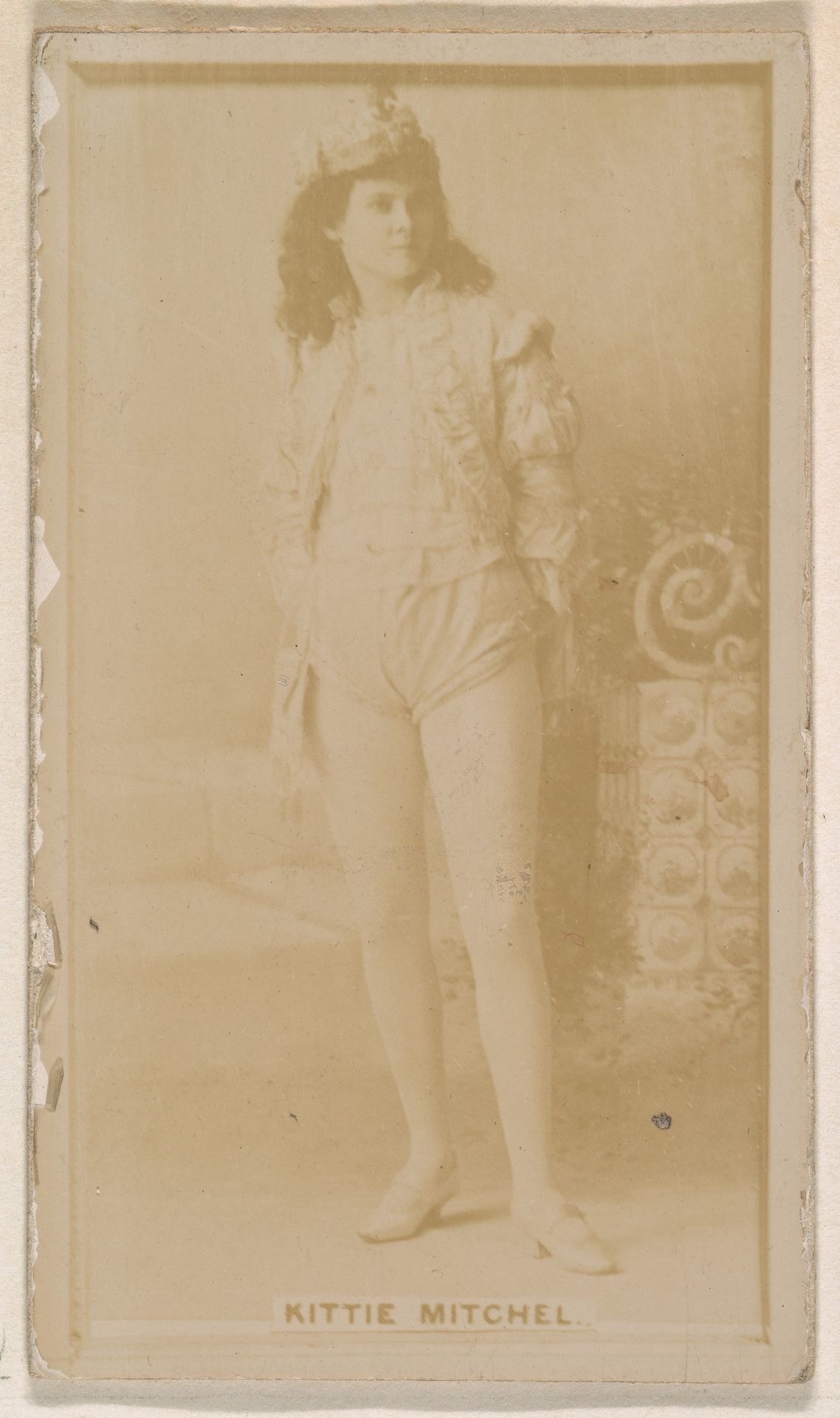 Kittie Mitchell, from the Actresses series (N245) issued by Kinney Brothers to promote Sweet Caporal Cigarettes by Kinney Brothers Tobacco Company