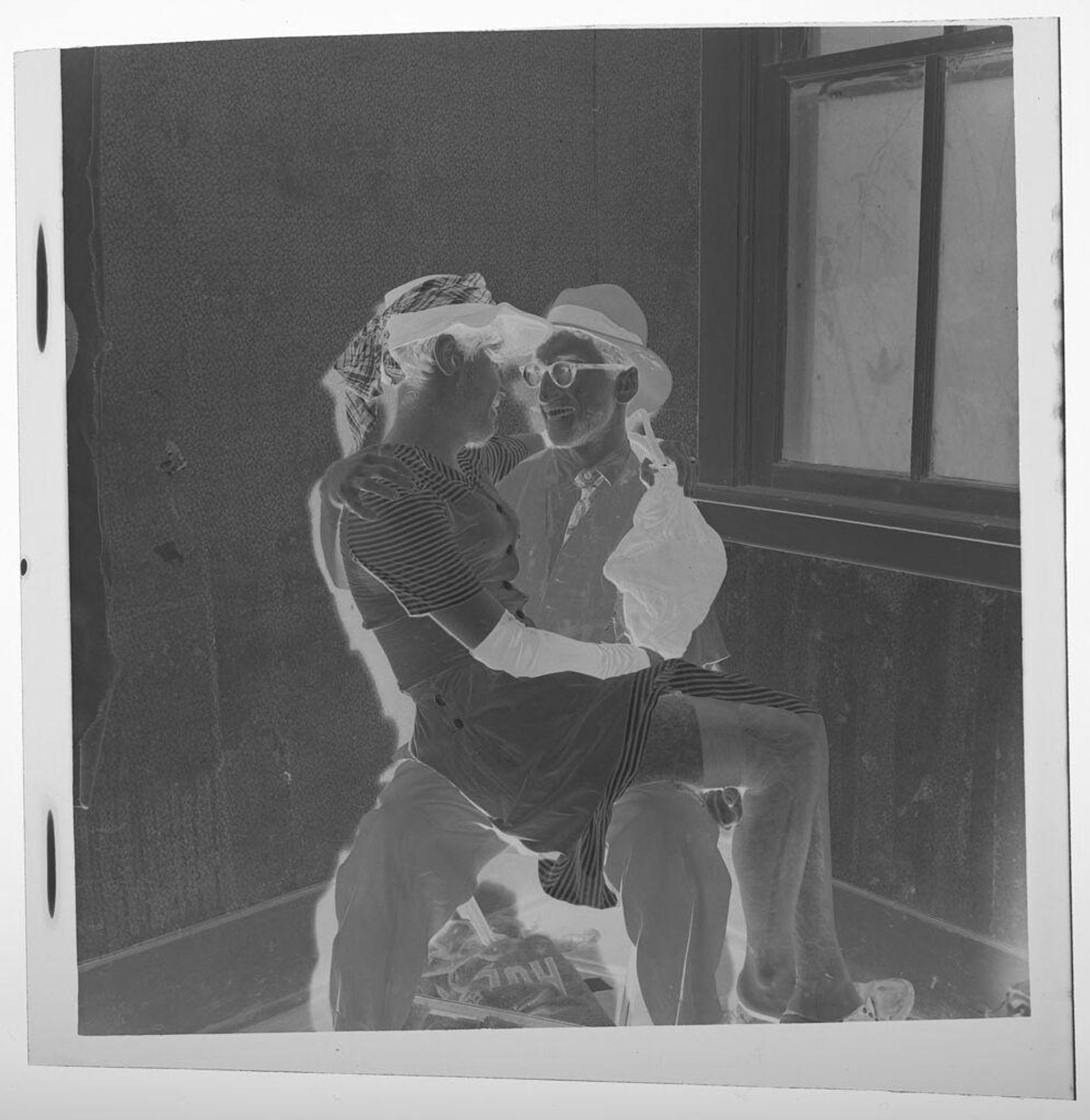 Untitled (fraternity dance, woman sitting on man's lap) by Jack Gould