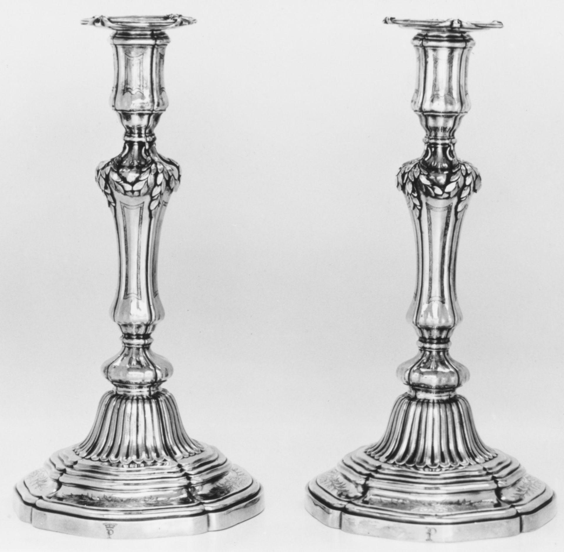 Pair of candlesticks by Jacques Roettiers