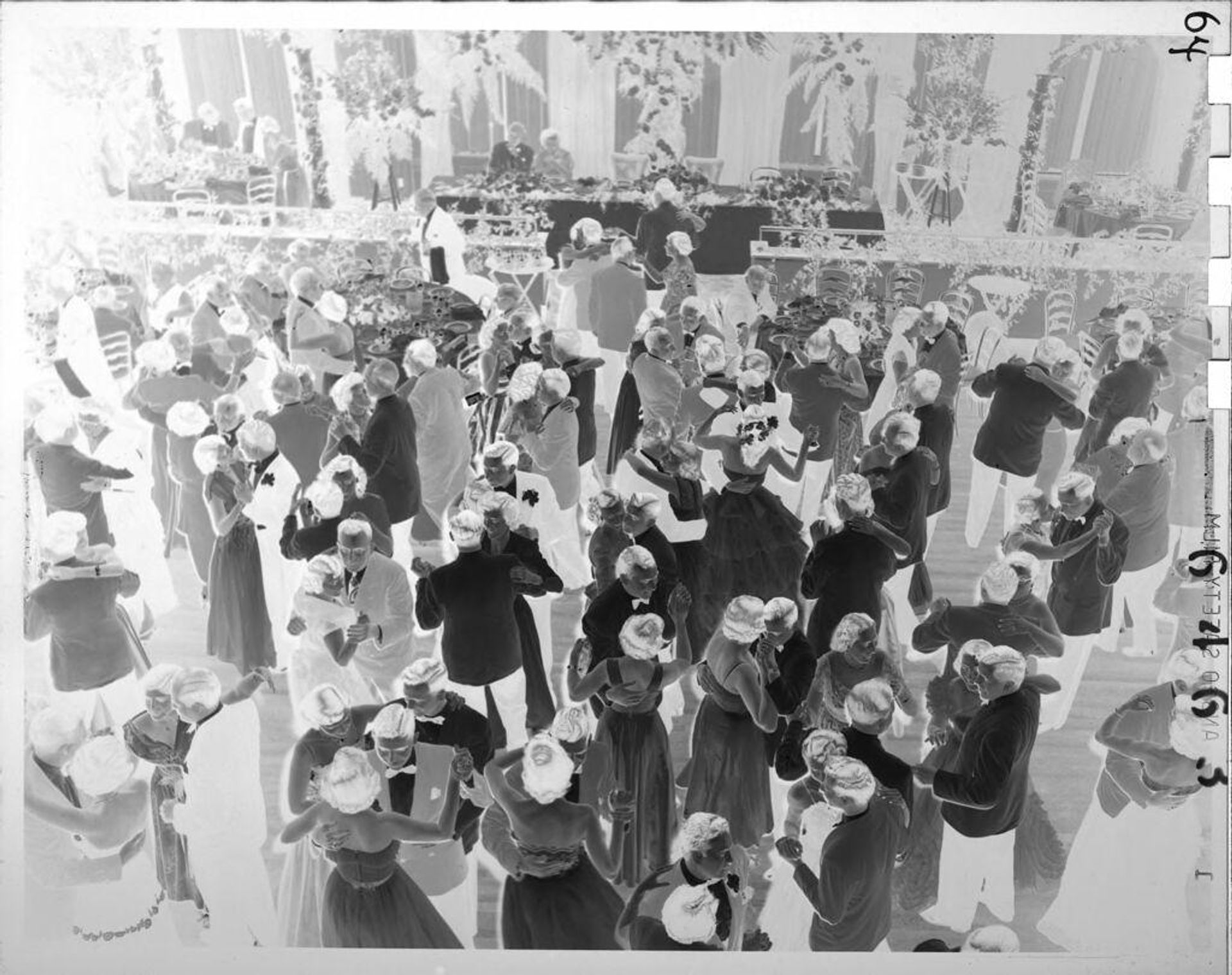 Untitled (people dancing at ball, seen from above) by Robert Burian