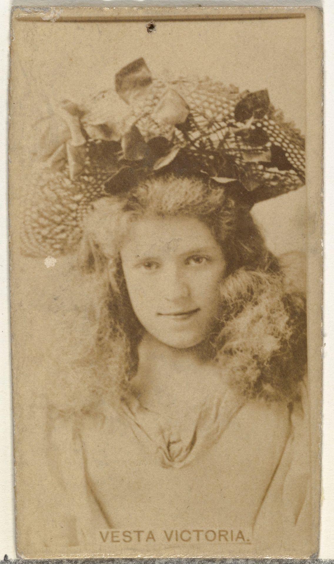 Vesta Victoria, from the Actors and Actresses series (N145-8) issued by Duke Sons & Co. to promote Duke Cigarettes by W. Duke, Sons & Co.