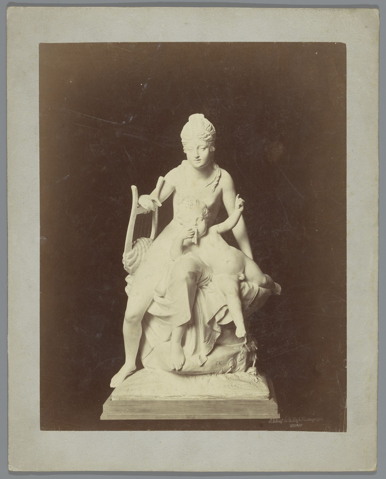 Beeld van (vermoedelijk) Terpsichore met een lier en een fluitend kindfiguur by J. Loroy