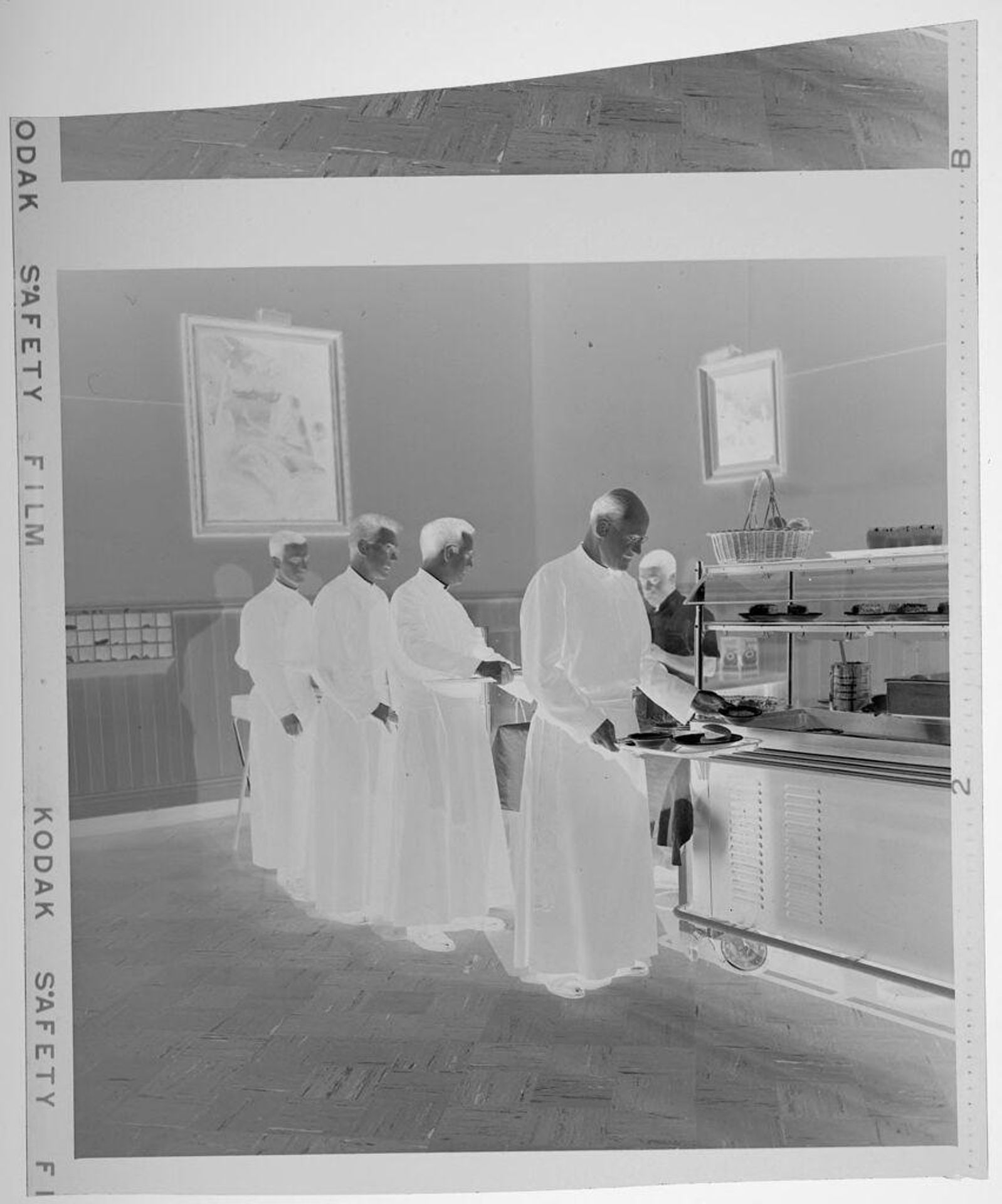 Untitled (priests in cafeteria line) by Jack Gould