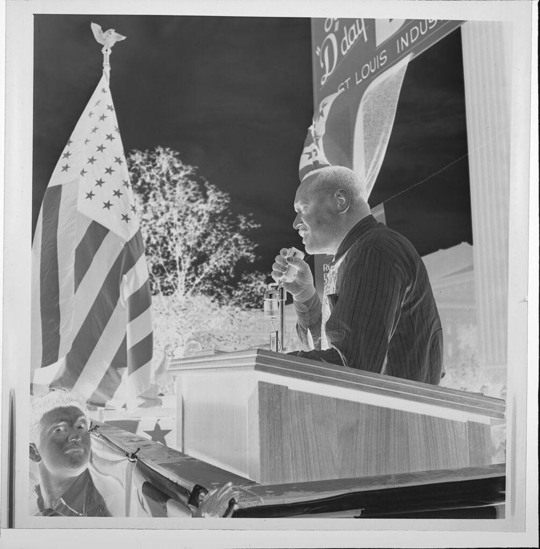 Untitled (man giving speech at podium) by Jack Gould