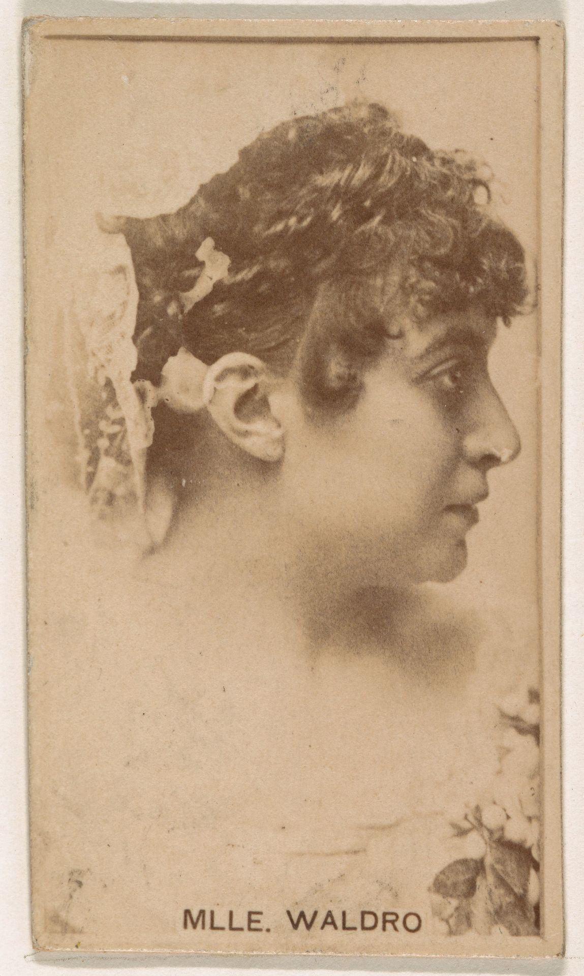 Mlle. Waldro, from the Actresses series (N245) issued by Kinney Brothers to promote Sweet Caporal Cigarettes by Kinney Brothers Tobacco Company