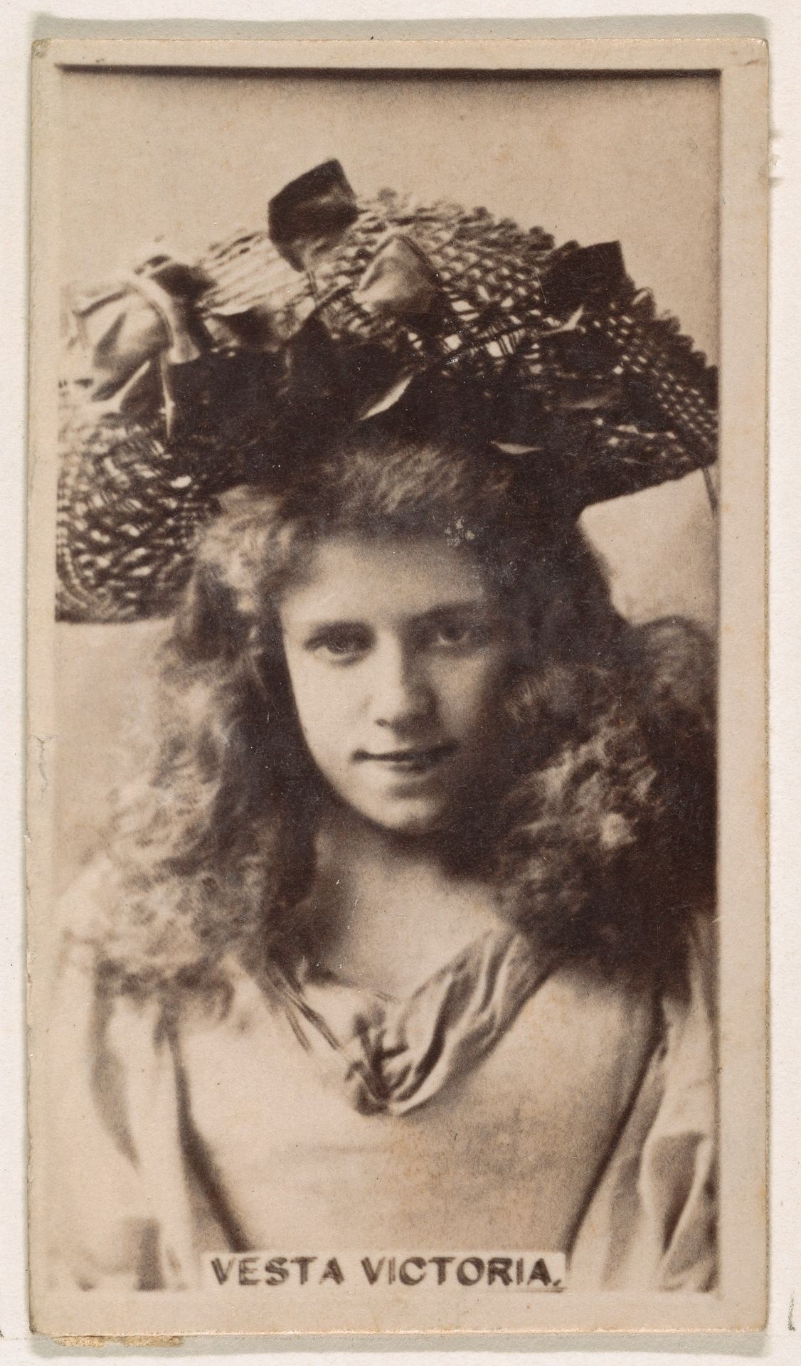 Vesta Victoria, from the Actresses series (N245) issued by Kinney Brothers to promote Sweet Caporal Cigarettes by Kinney Brothers Tobacco Company