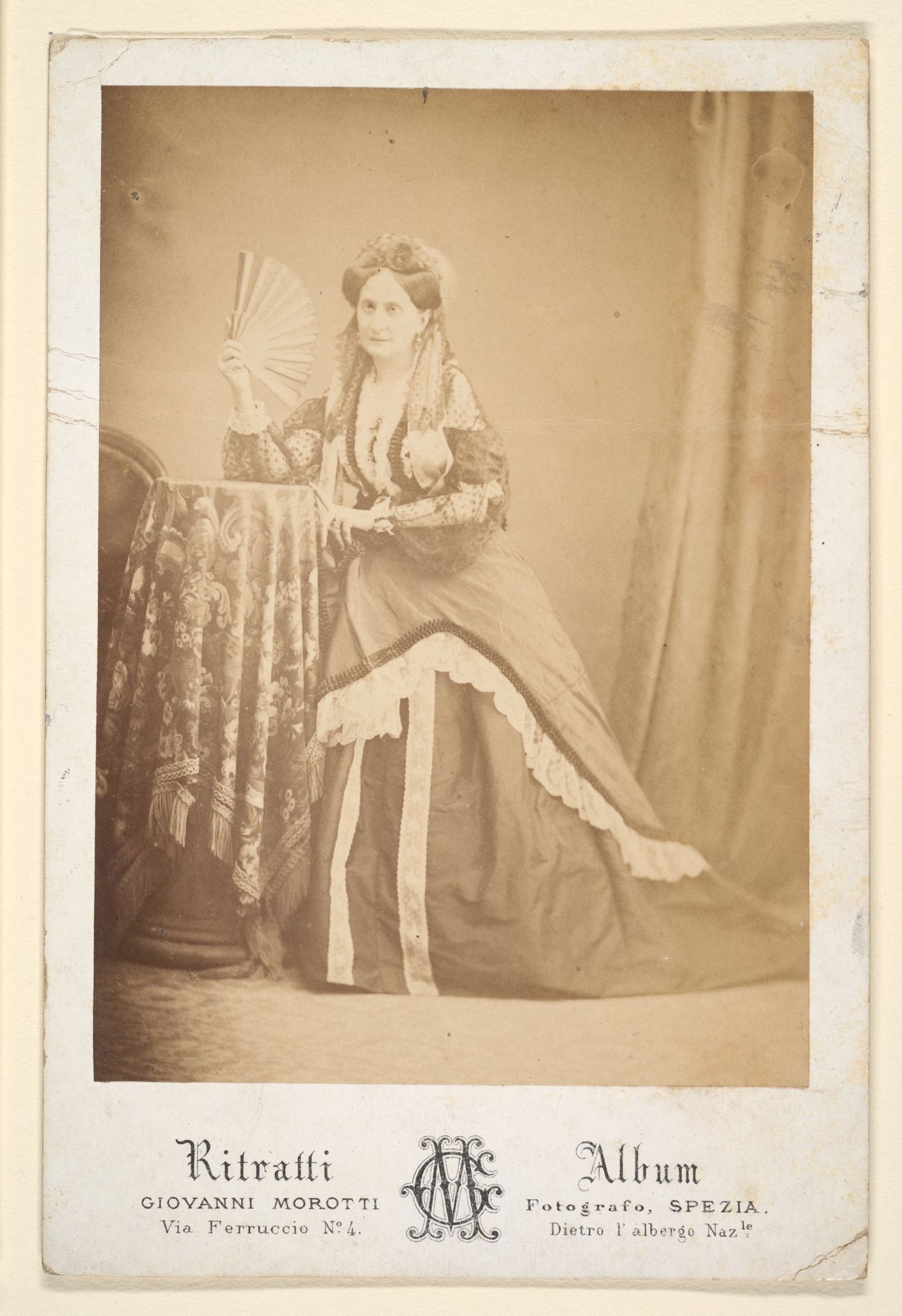 [La Comtesse at Table Holding Fan] by Giovanni Morotti