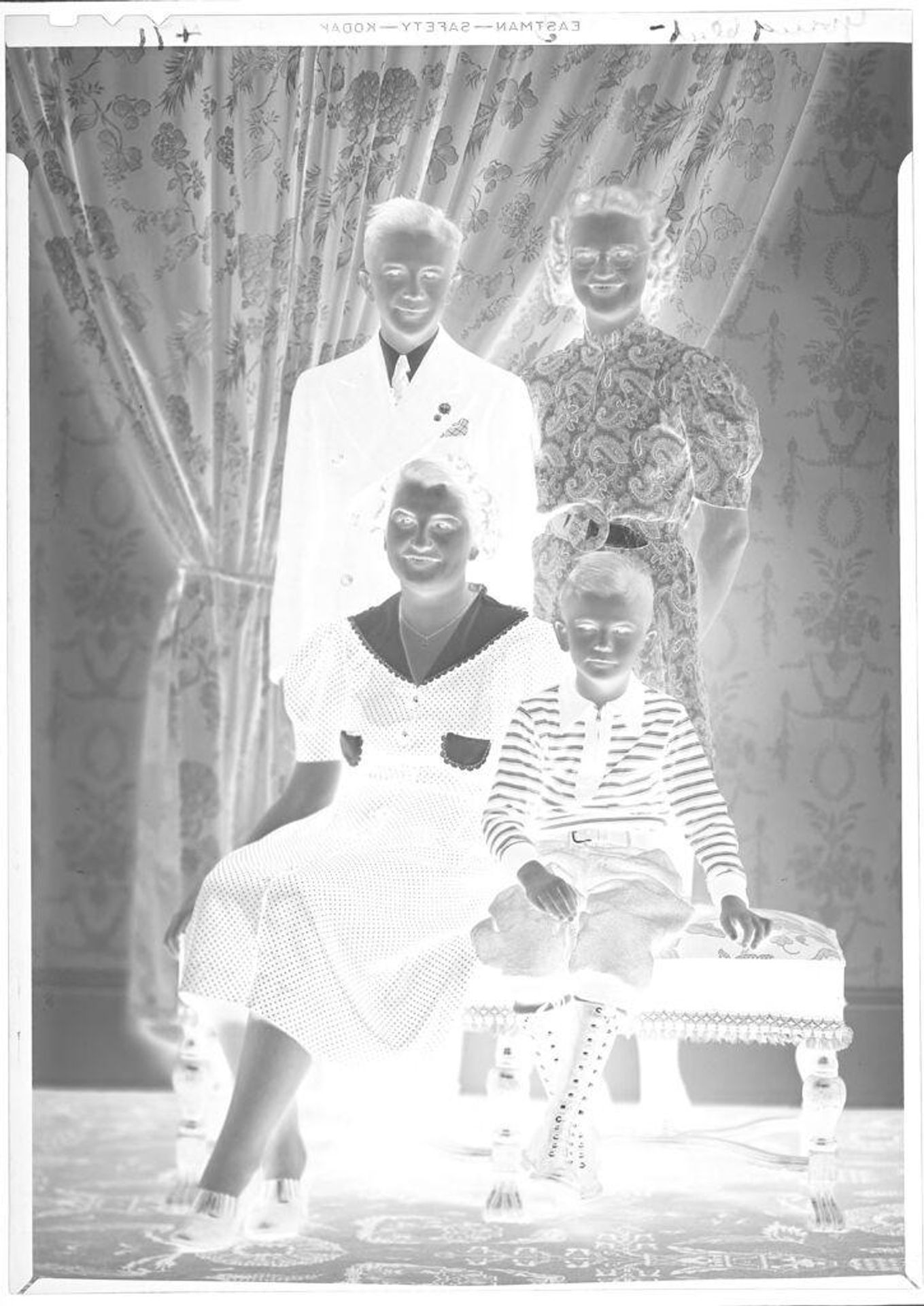 Untitled (portrait of a family in the studio) by John Deusing