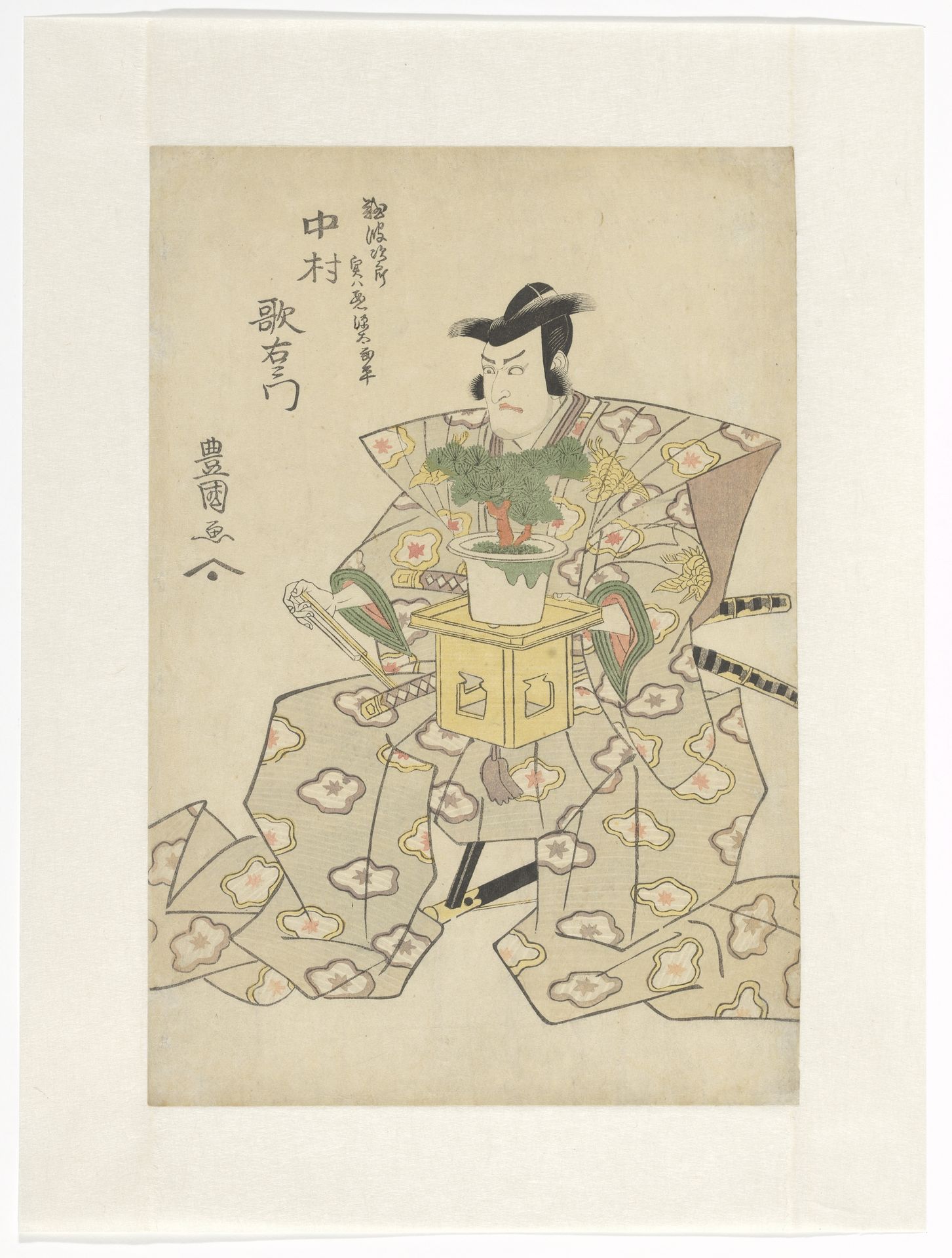 Nakamura Utaemon III holds bonsai tree by Utagawa Toyokuni I