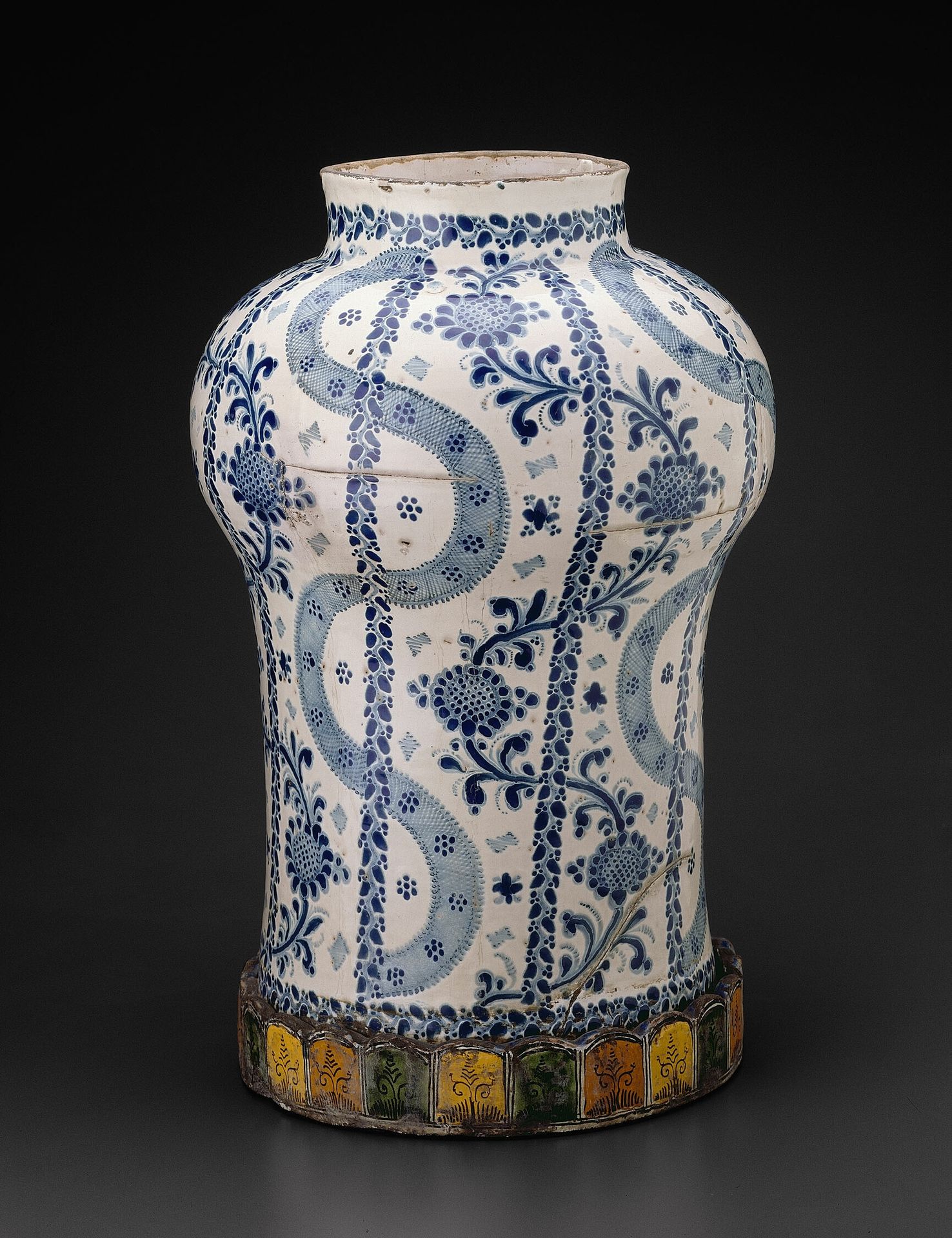 Jar with Vertical Flowing Bands and Vines with Sunflowerlike Blossoms by Talavera Poblana