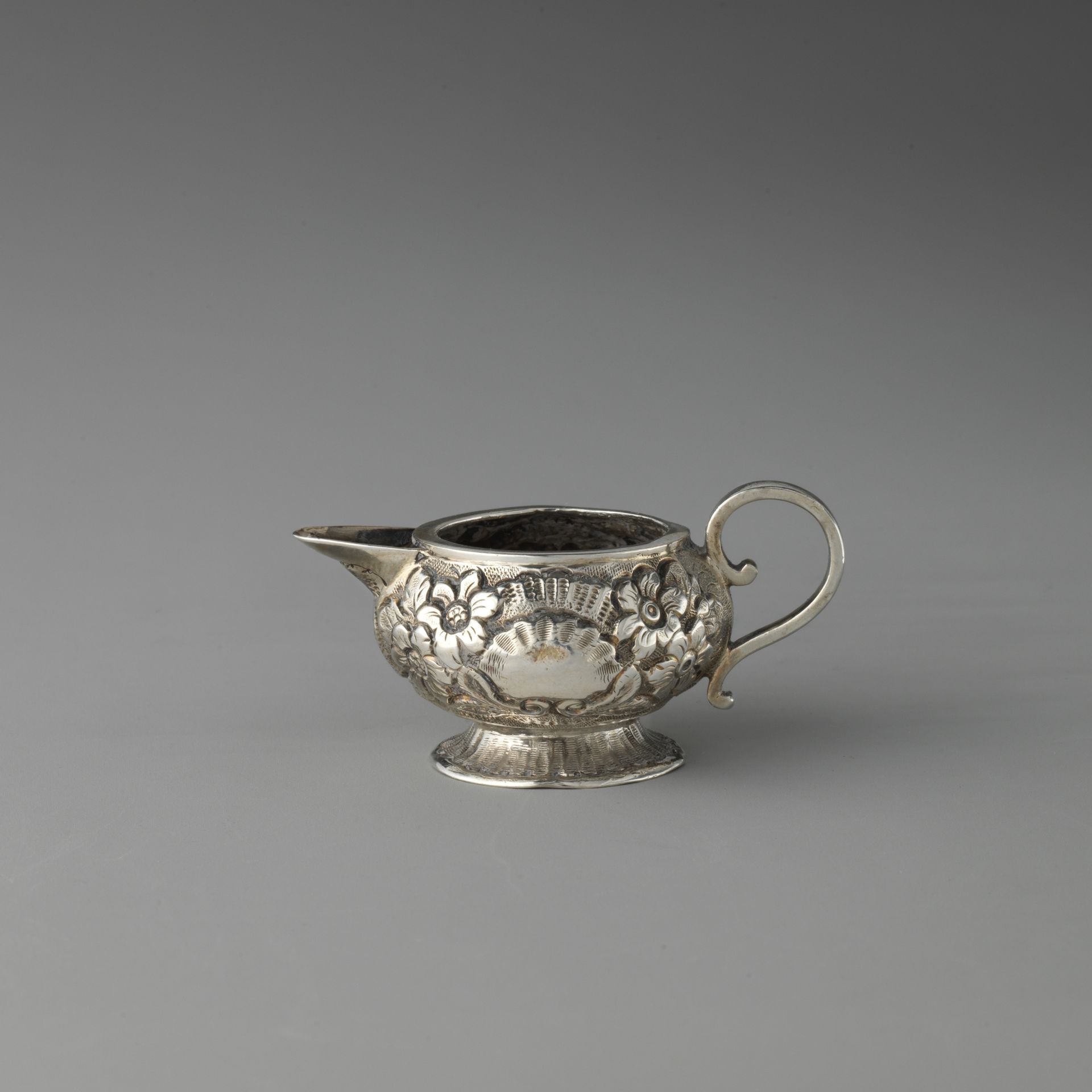 Miniature creamer (part of a set) by Henry Flavelle