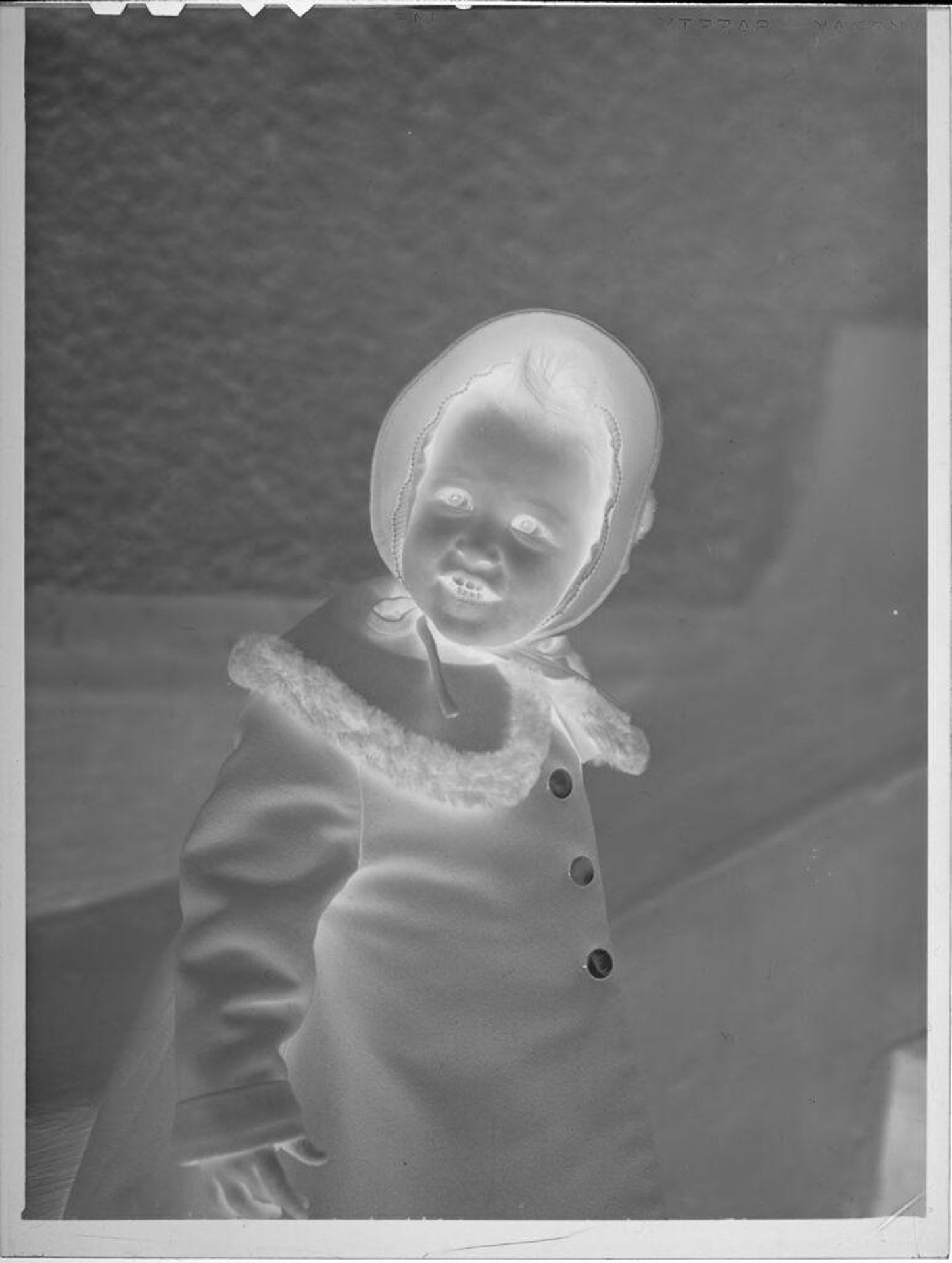 Untitled (baby in bonnet) by Lucian and Mary Brown
