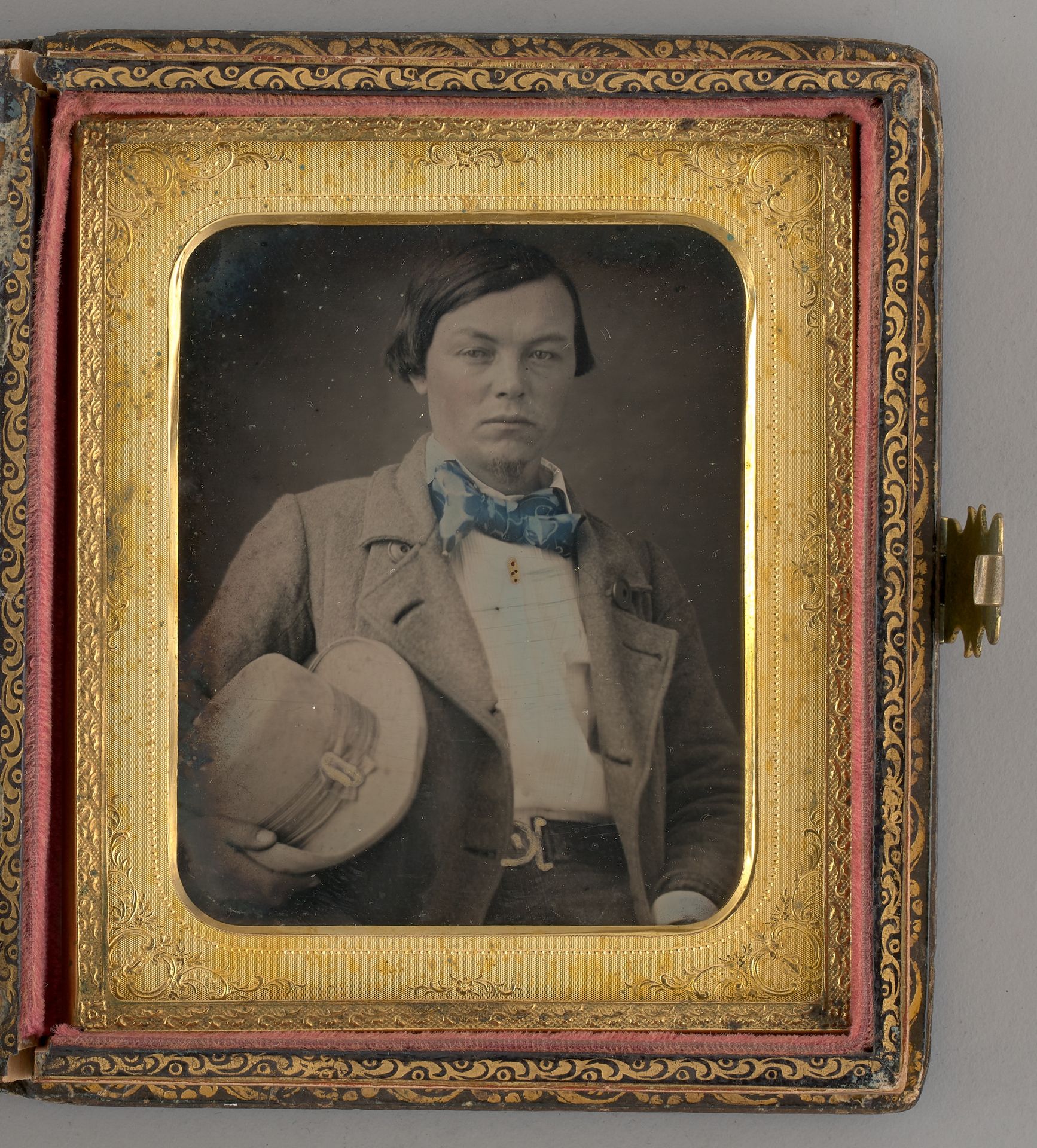 Untitled (Portrait of a Boy Holding a Hat) by George H. Johnson
