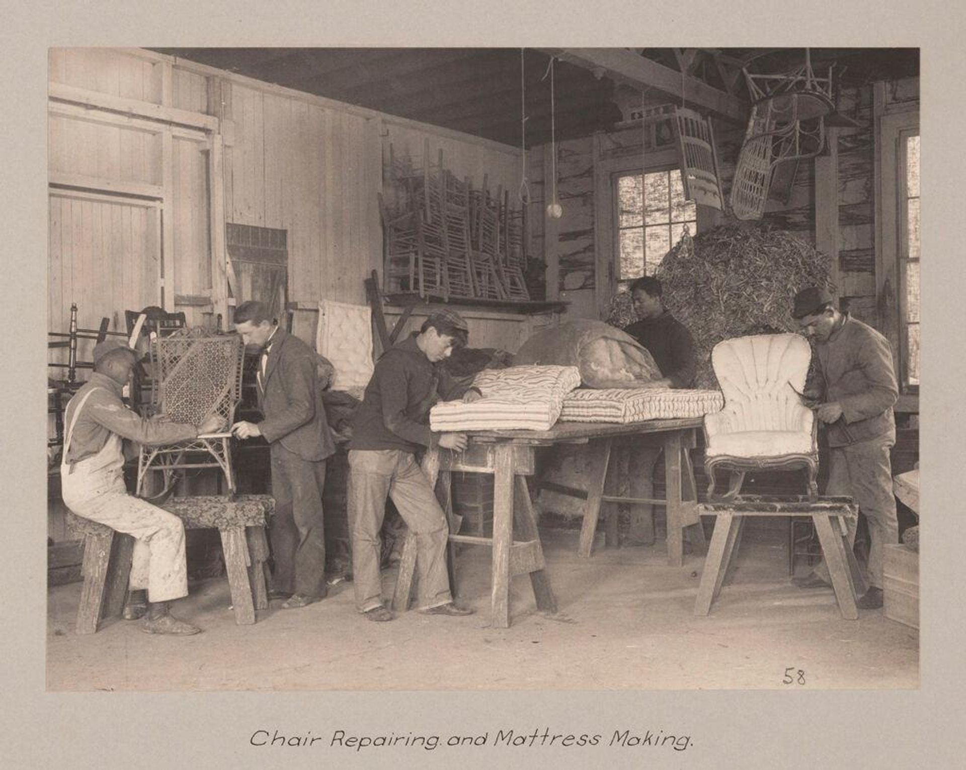 Races, Negroes: United States. Virginia. Hampton. Hampton Normal and Industrial School: Agencies Promoting Assimilation of the Negro. Training for Commercial and Industrial Employment. Hampton Normal and Agricultural Institute, Hampton, Va.: Chair Repairing and Mattress Making. by Frances Benjamin Johnston