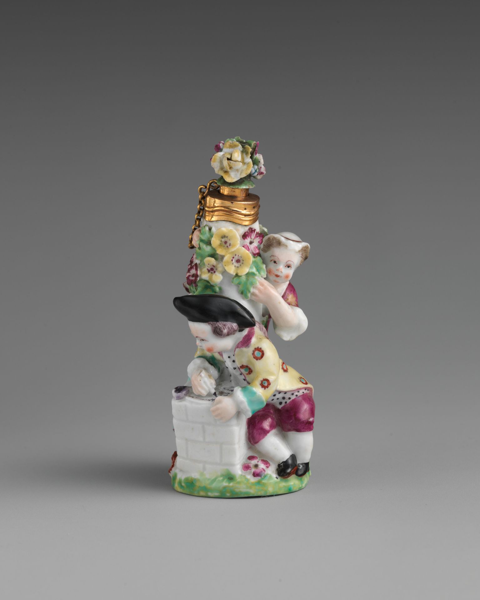 Boy letter-writer and girl in group by Chelsea Porcelain Manufactory