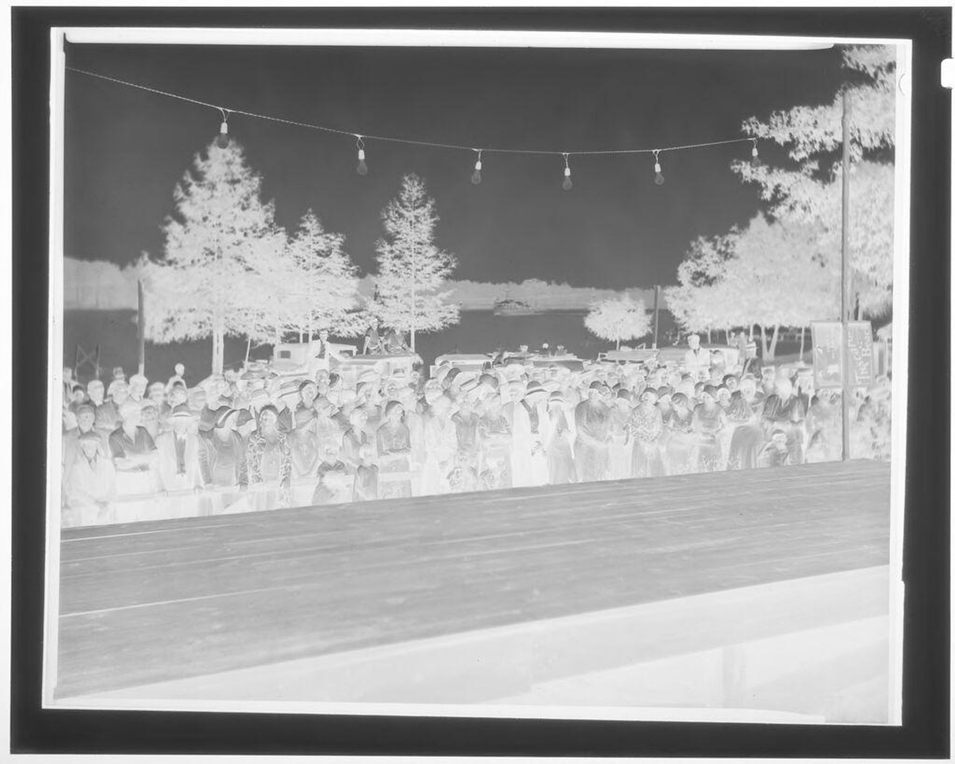 Untitled (crowd gathered, Tuscarona Beach) by Hamblin Studio
