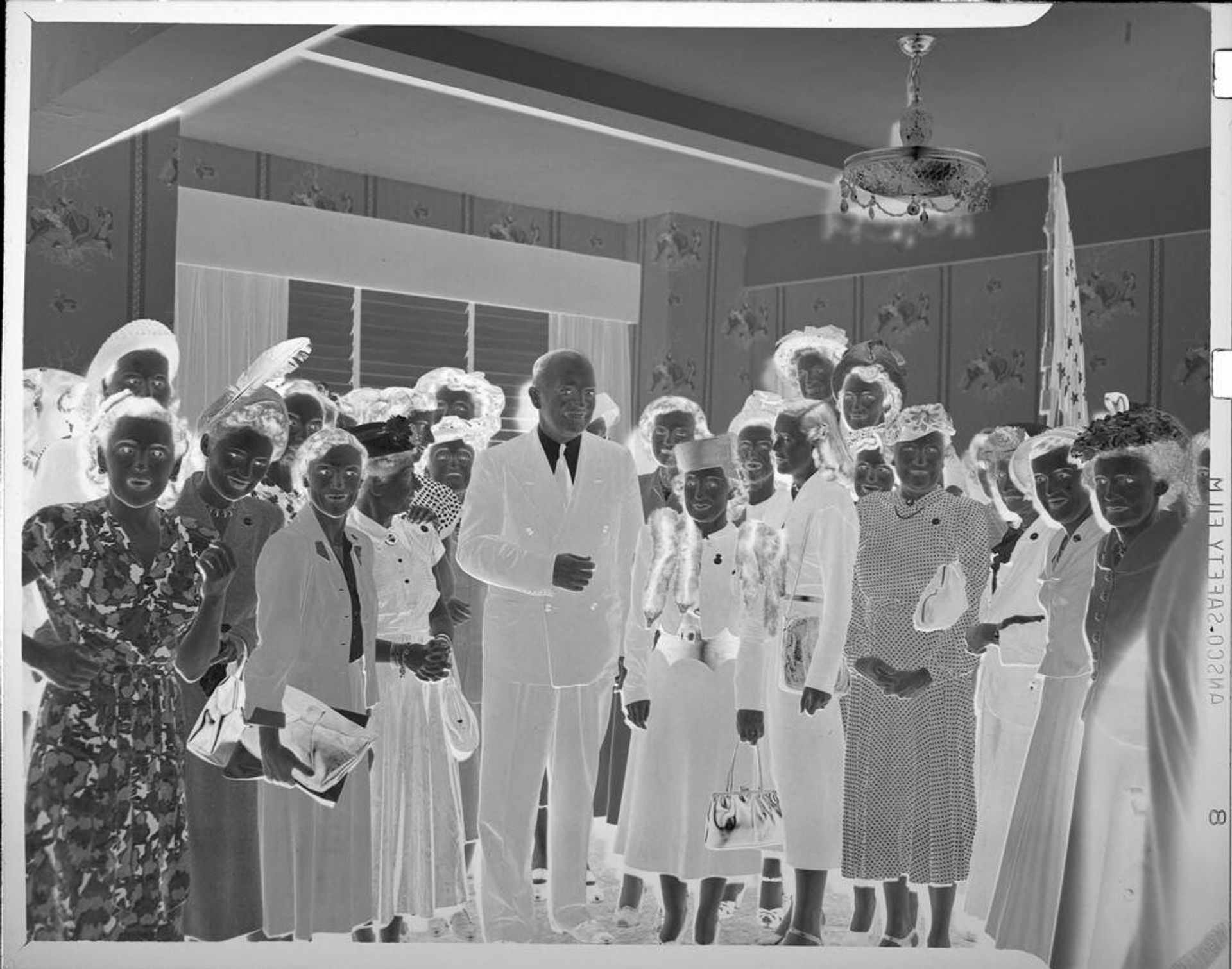 Untitled (group of people smiling) by Peter James Studio