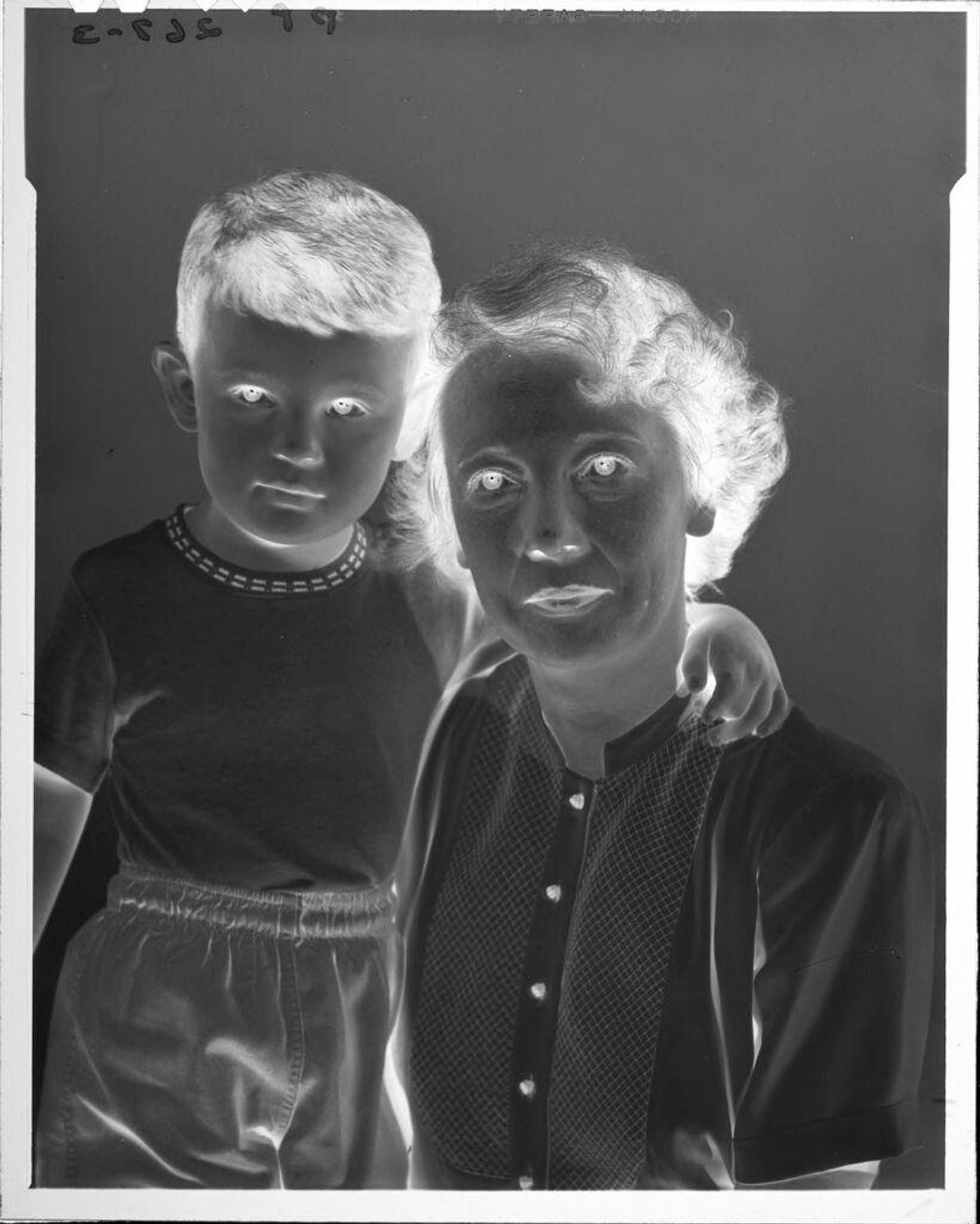 Untitled (portrait of woman and boy) by John Howell