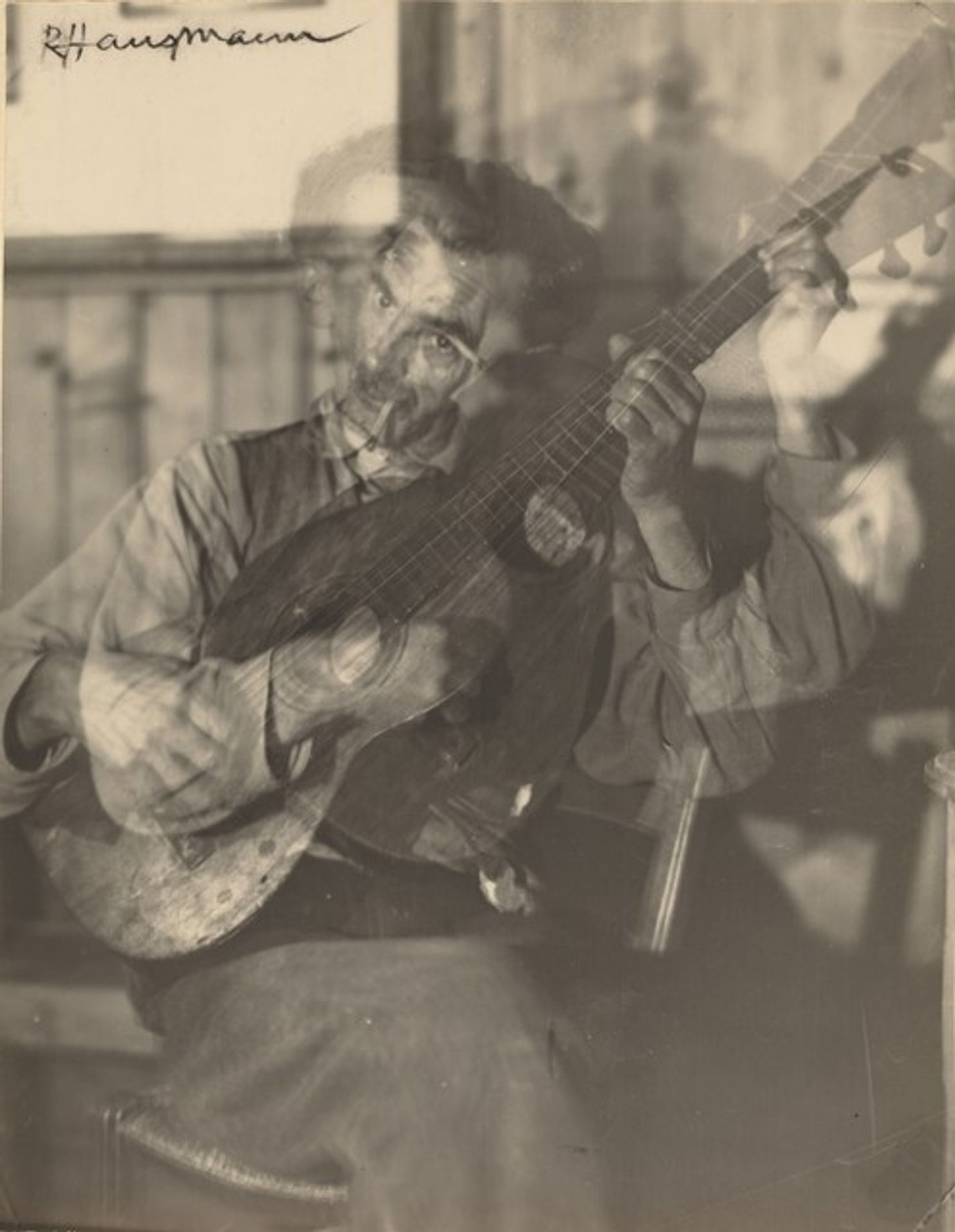 Llorenç Carbonell Playing Guitar, Ibiza by Raoul Hausmann