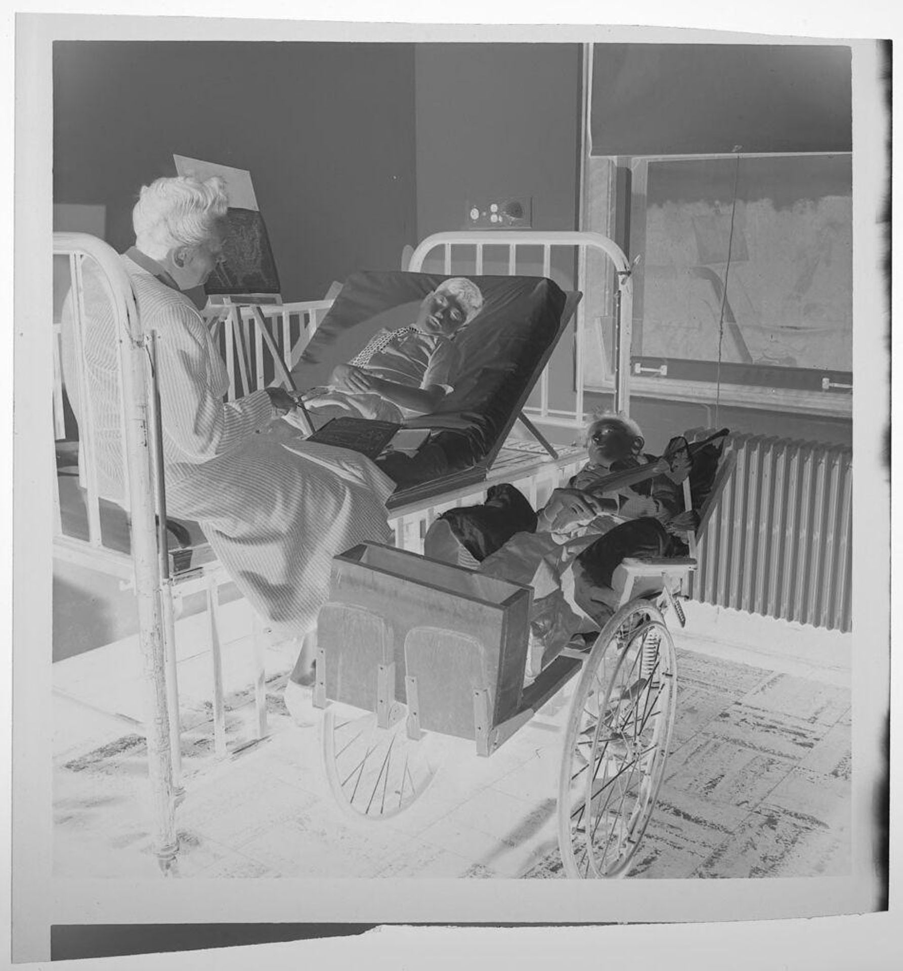 Untitled (children with polio in hospital, visiting with adult) by Jack Gould