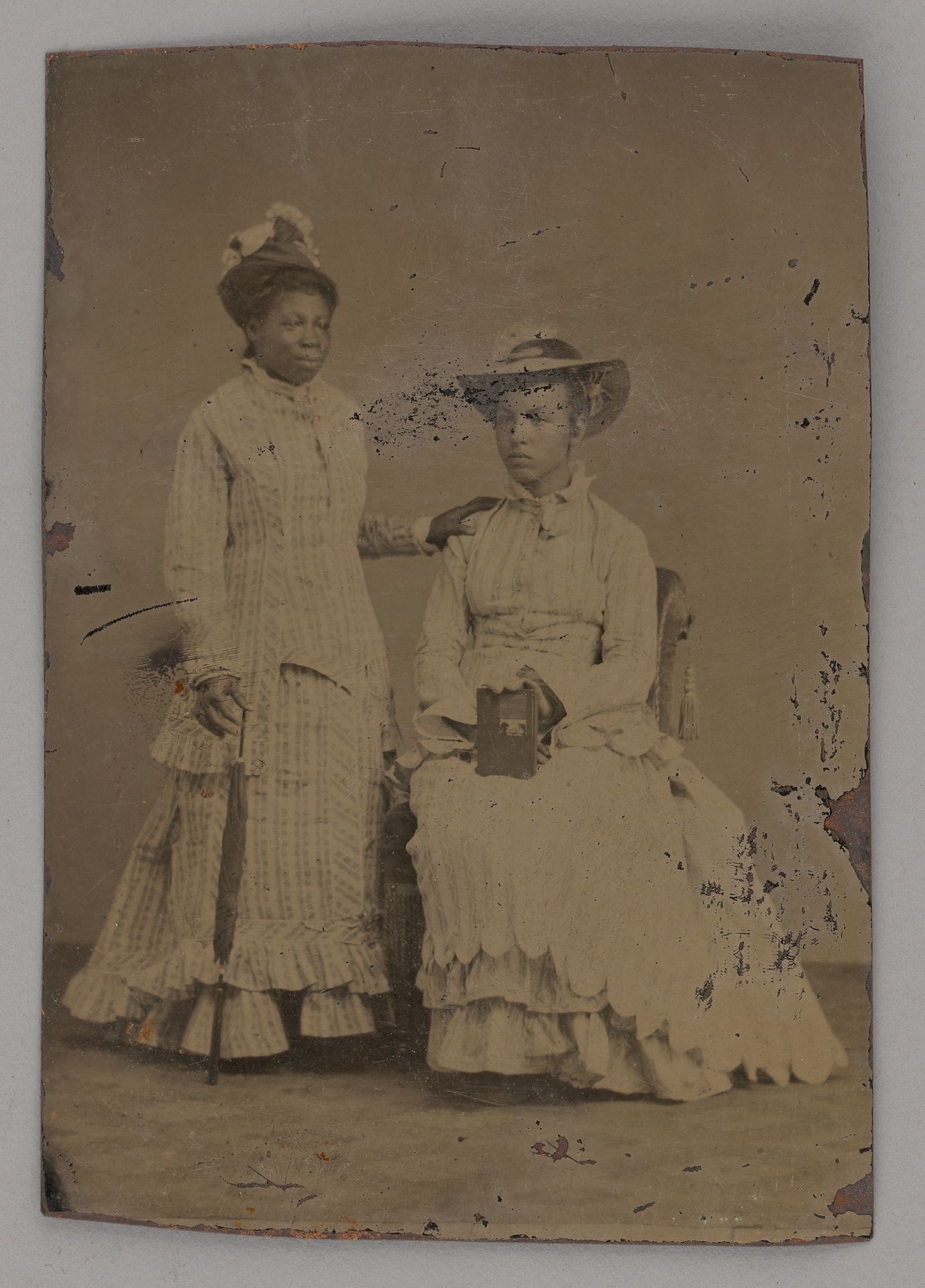 Untitled (Portrait of One Standing Woman and One Seated Woman) by Anonymous
