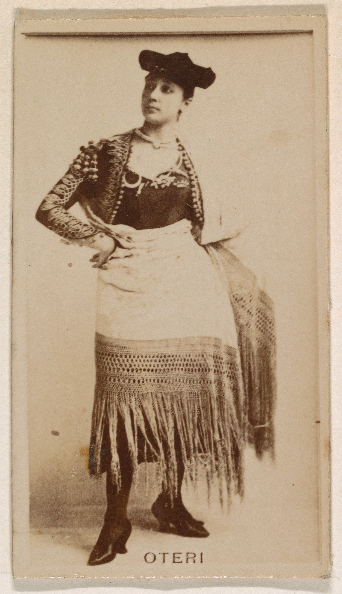 Miss Oteri, from the Actresses series (N245) issued by Kinney Brothers to promote Sweet Caporal Cigarettes by Kinney Brothers Tobacco Company