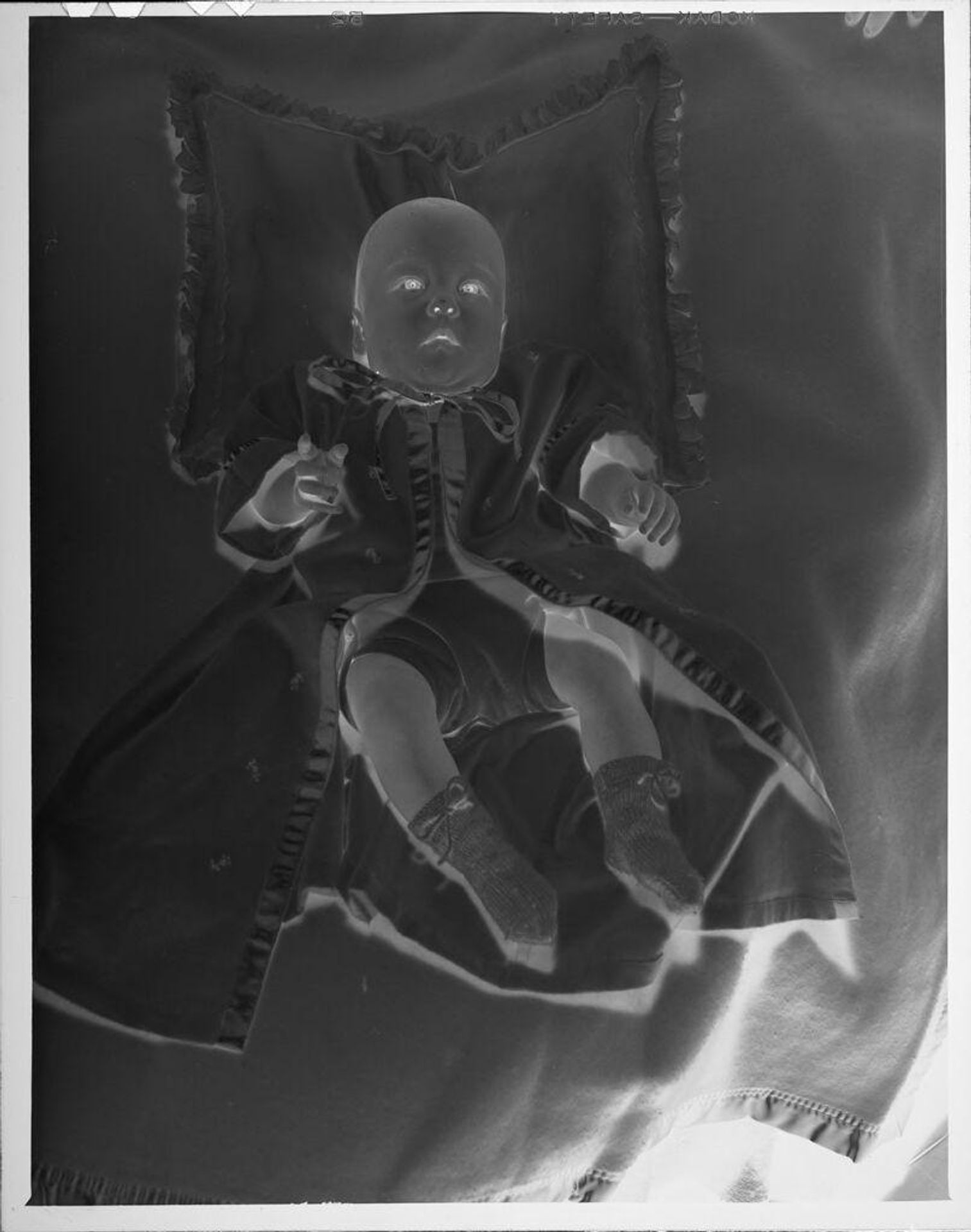 Untitled (baby on blanket) by Lucian and Mary Brown