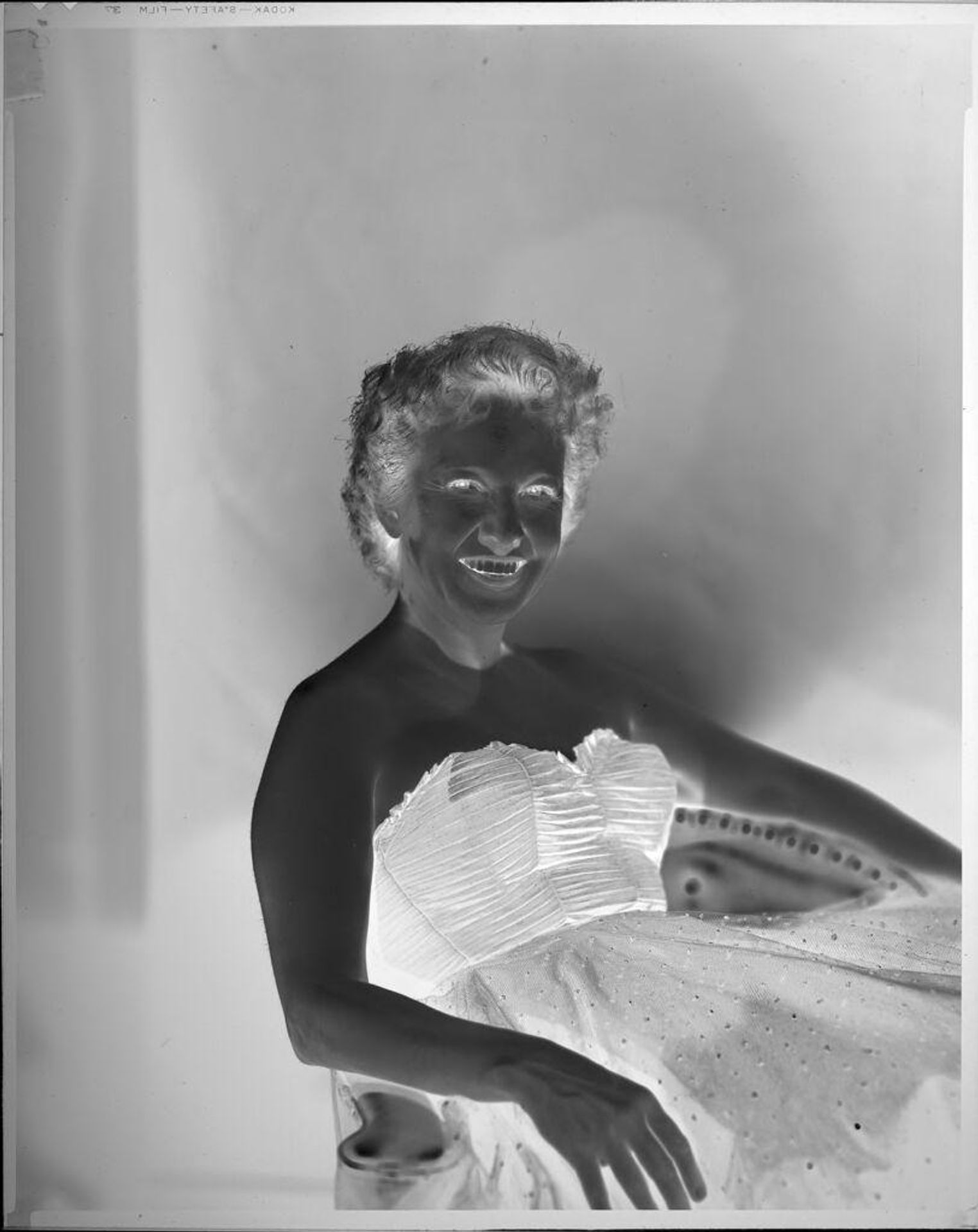 Untitled (portrait of woman wearing formal gown) by C. Bennette Moore